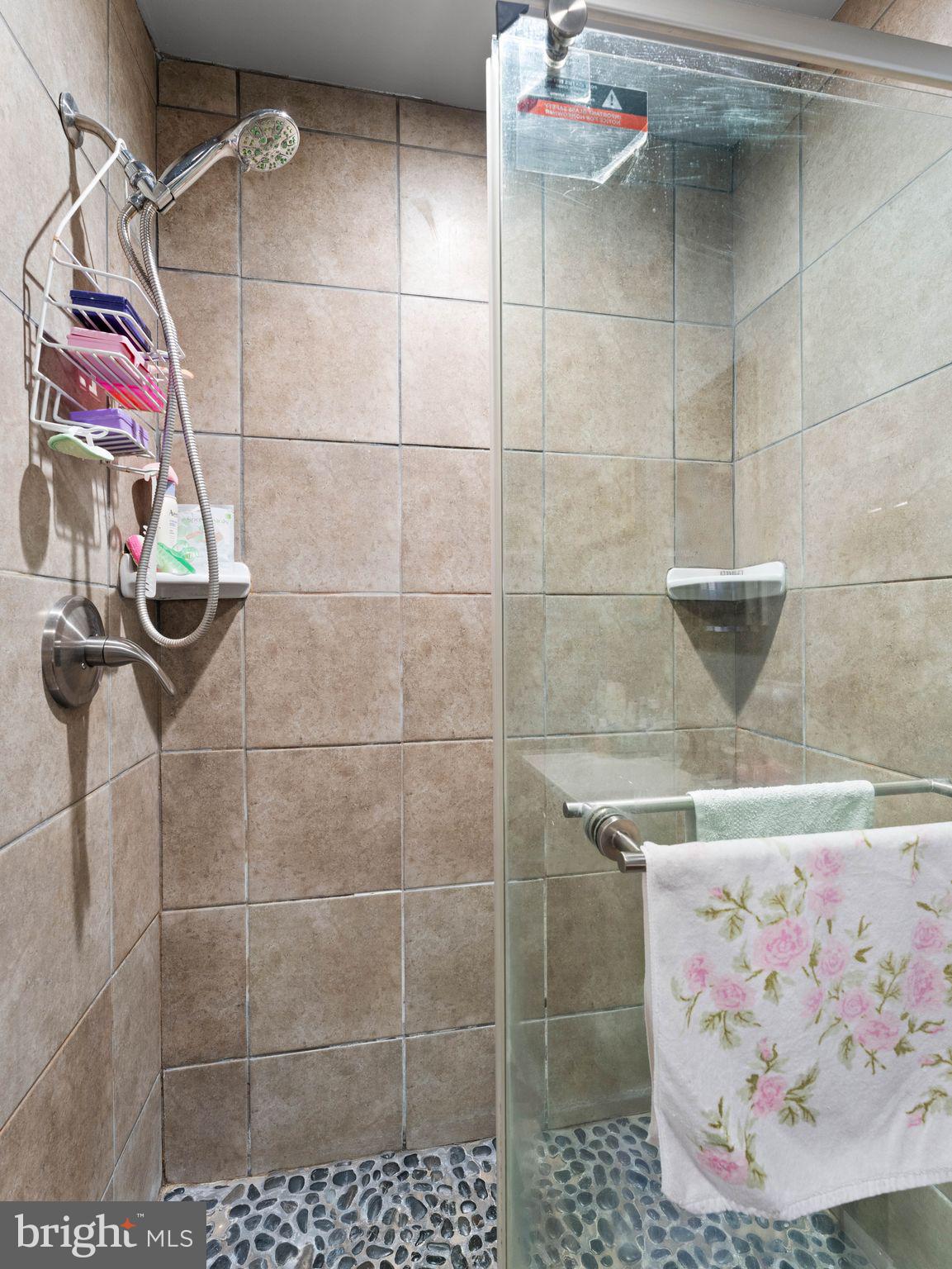 435 Mechanic Street Camden, NJ 08104 - Photo 12 of 16 a bathroom with a bathtub and shower