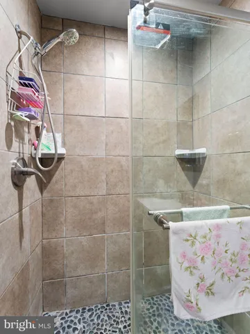 a living room with lots of furniture and a rug