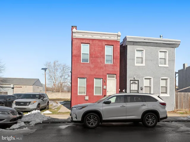 a car parked in front of a building