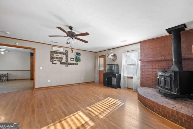 a view of a livingroom with a kitchen