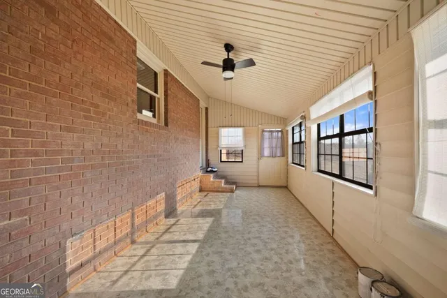 a hallway with windows