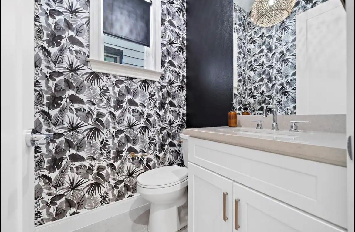 3703 Bolin Road, Unit B Houston, TX 77092 - Photo 18 of 22 a bathroom with a sink toilet and shower