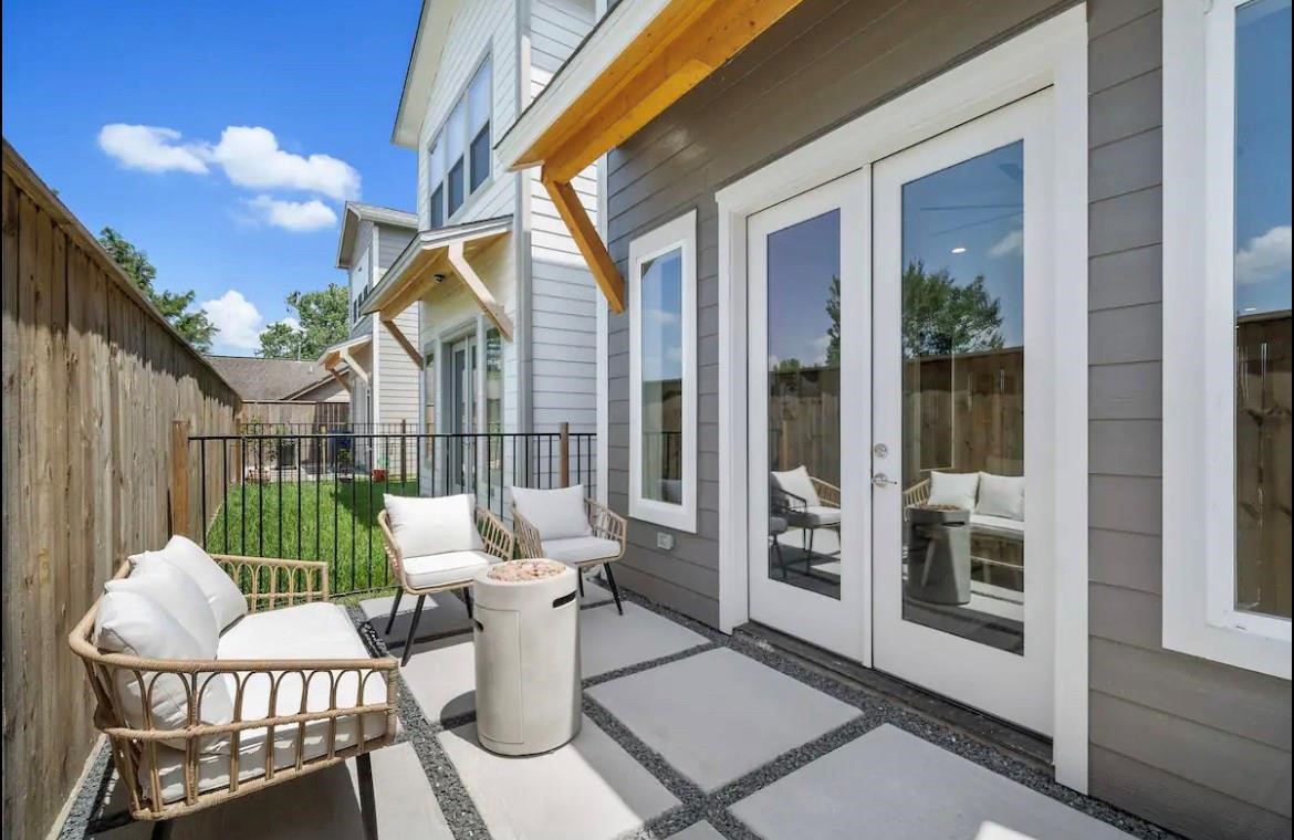 3703 Bolin Road, Unit B Houston, TX 77092 - Photo 20 of 22 a view of a chair and tables in the balcony