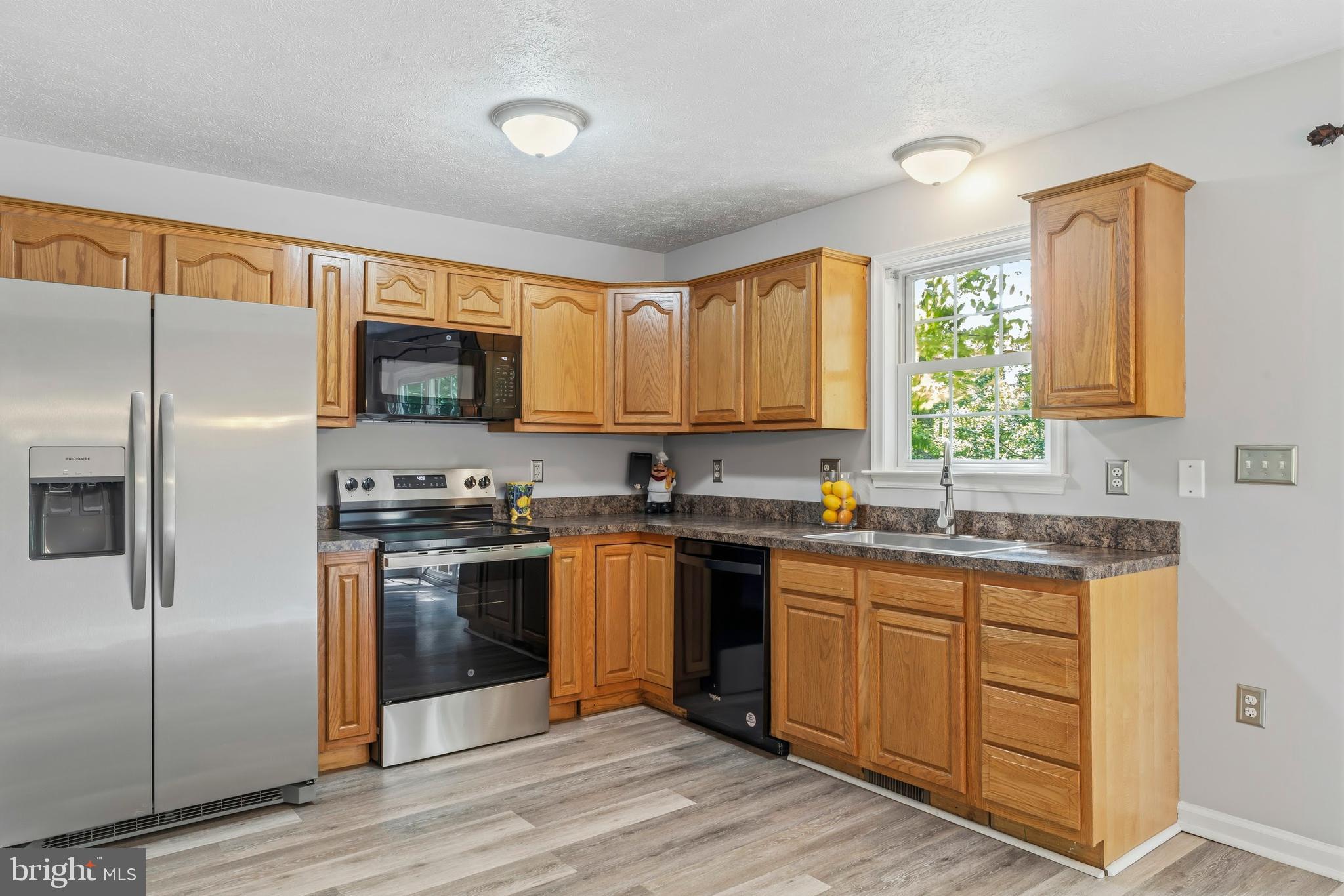 997 Wilderness Road Linden, VA 22642 - Photo 7 of 61 NEW LVP flooring in kitchen & NEW SS Frig & Stove