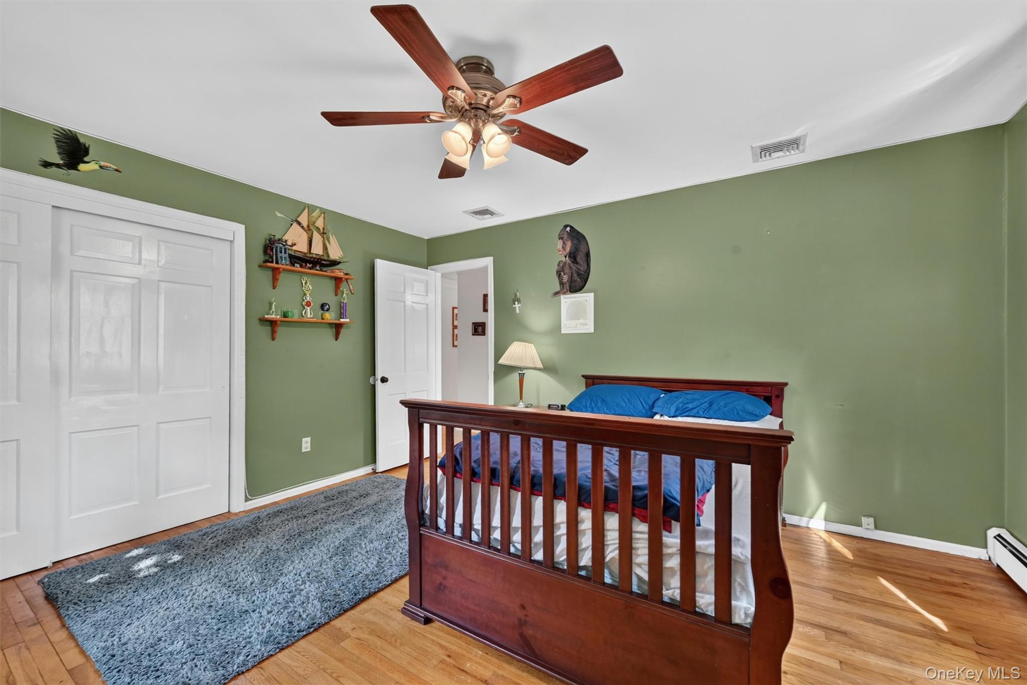 5 Hedges Road Warwick, NY 10990 - Photo 32 of 48 With hardwood floors, natural light, and closet space, this bedroom adds to the home’s practical and flexible ranch layout.