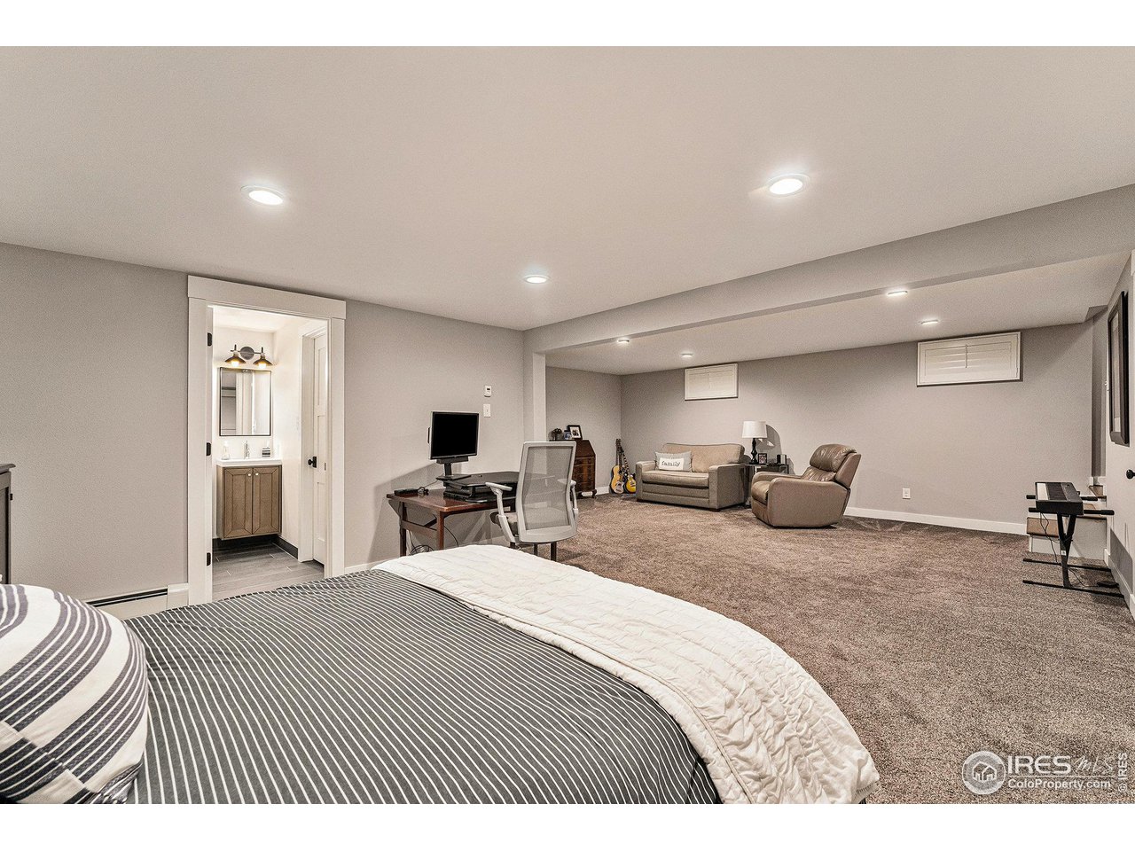 13700 Crabapple Road Golden, CO 80401 - Photo 23 of 39 a bed room with two bed and a chair