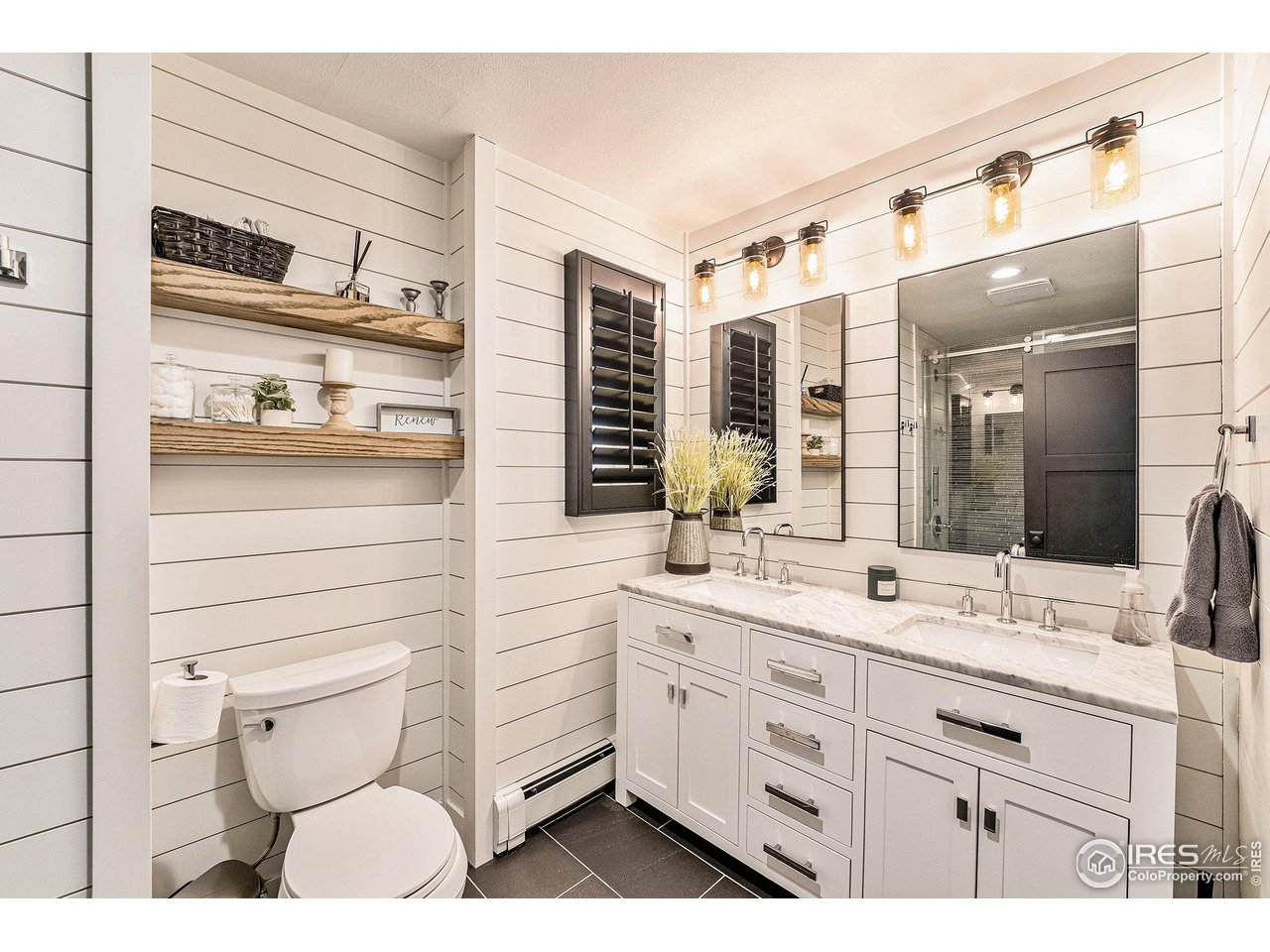 13700 Crabapple Road Golden, CO 80401 - Photo 25 of 39 a bathroom with a sink and a mirror