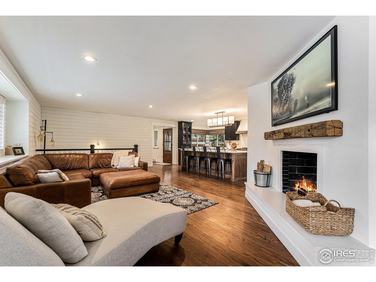 13700 Crabapple Road Golden, CO 80401 - Photo 5 of 39 a living room with furniture and a fireplace