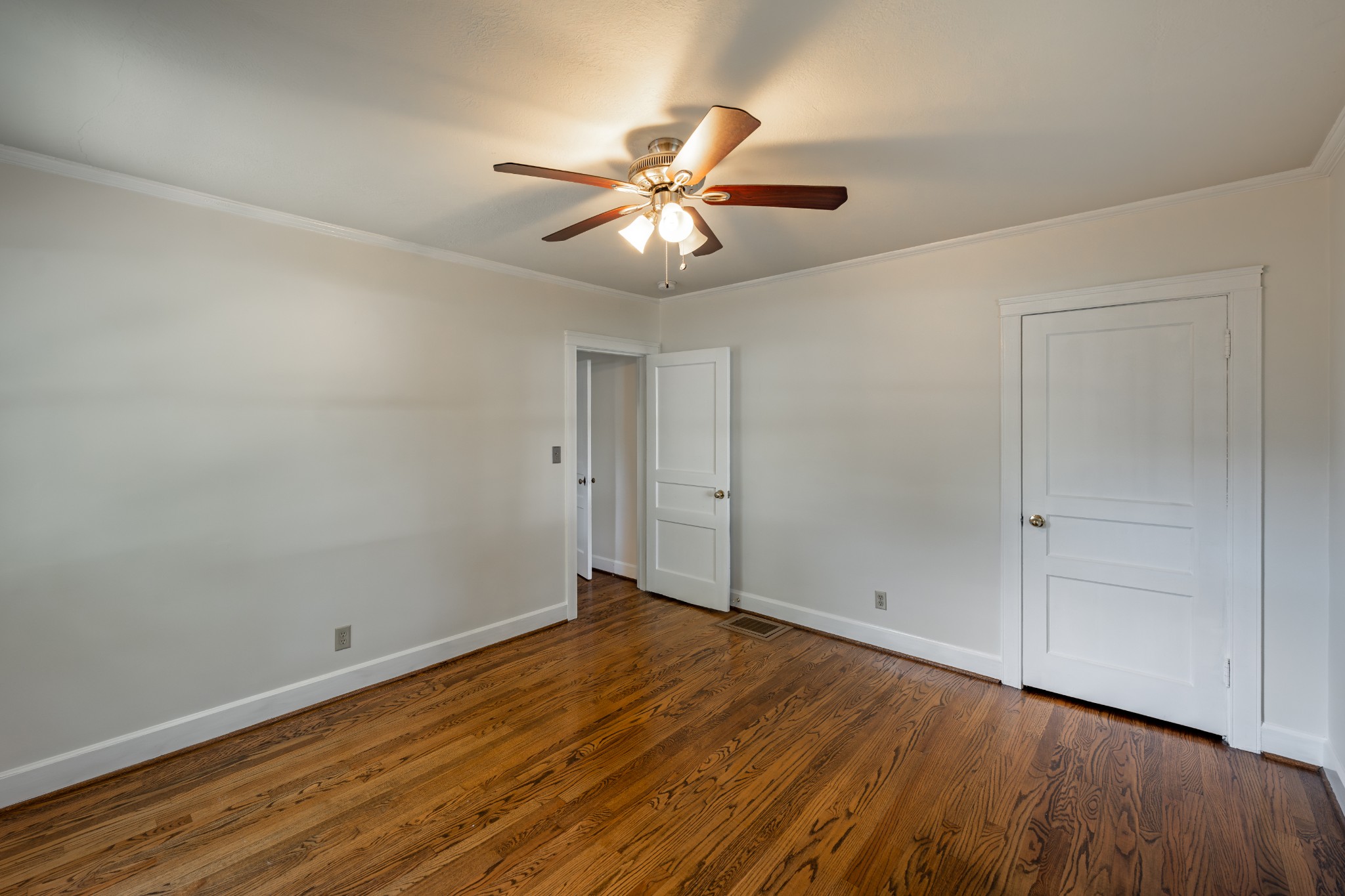3508 Robin Road Nashville, TN 37204 - Photo 13 of 32 a view of an empty room with wooden floor