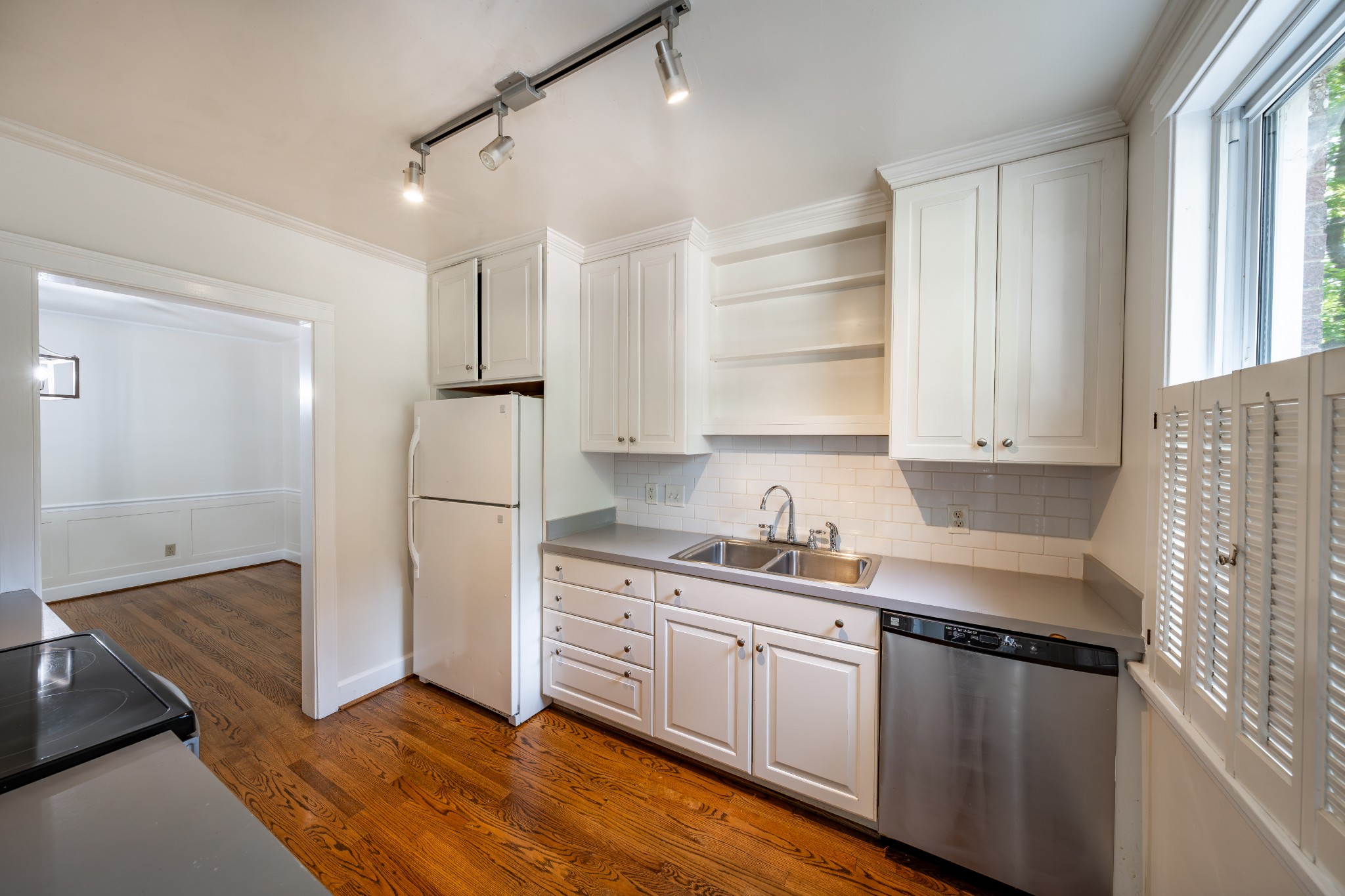 3508 Robin Road Nashville, TN 37204 - Photo 16 of 32 a kitchen with stainless steel appliances granite countertop a refrigerator sink and cabinets