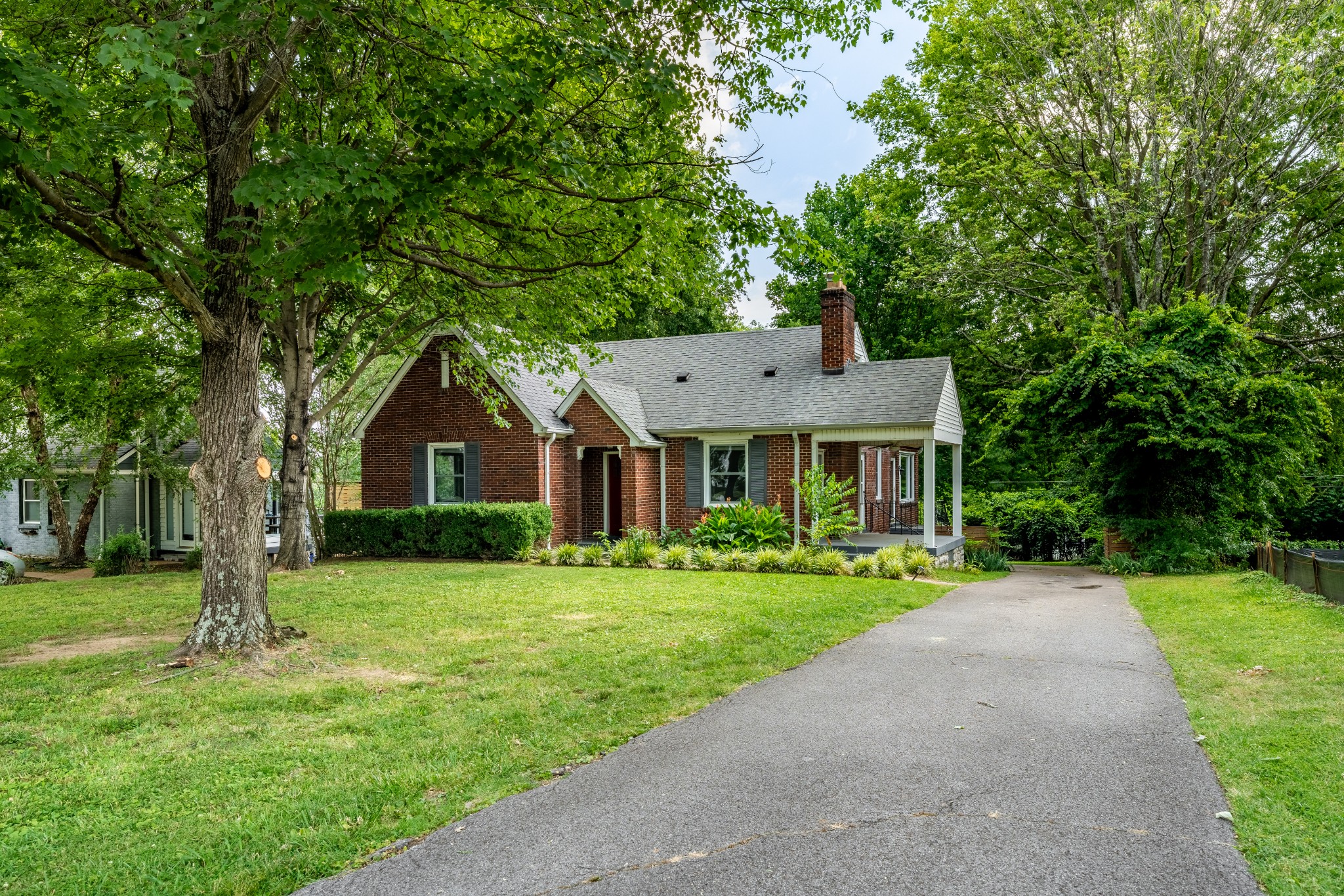 3508 Robin Road Nashville, TN 37204 - Photo 2 of 32 a front view of a house with a yard