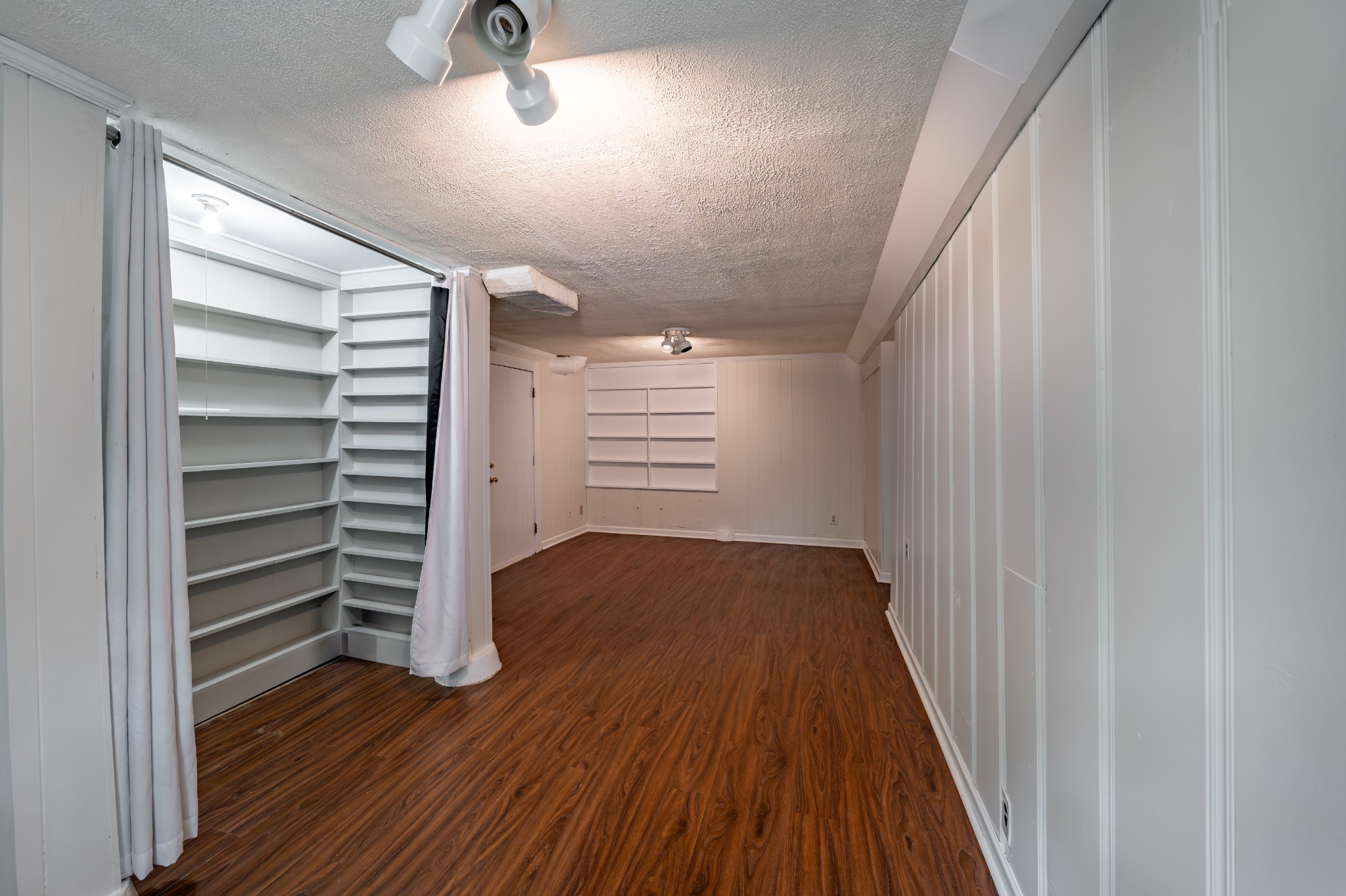 3508 Robin Road Nashville, TN 37204 - Photo 26 of 32 a view of walk in closet with empty racks