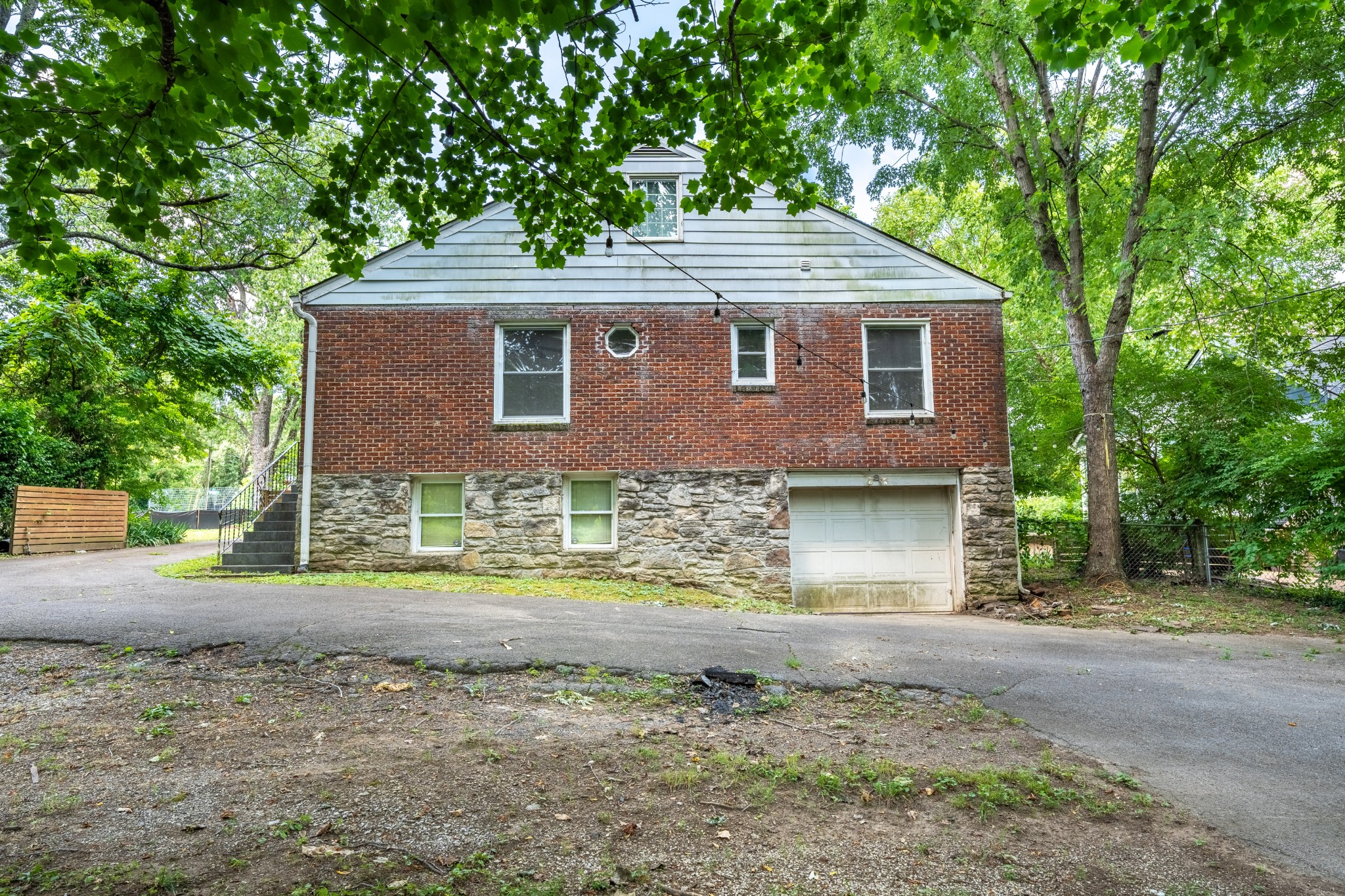 3508 Robin Road Nashville, TN 37204 - Photo 4 of 32 a front view of a house with a yard