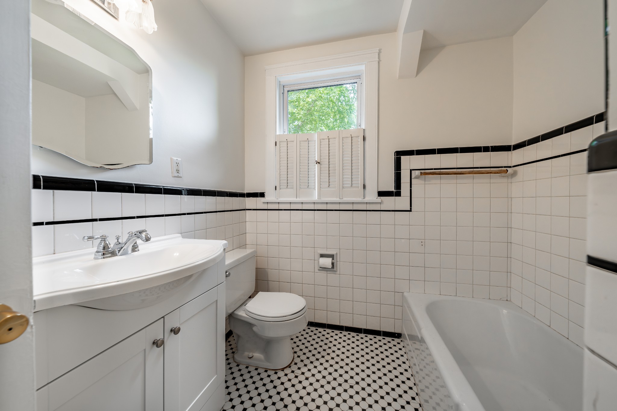 3508 Robin Road Nashville, TN 37204 - Photo 9 of 32 a bathroom with a sink a toilet and shower