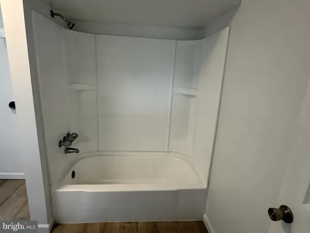 a bathroom with a bathtub