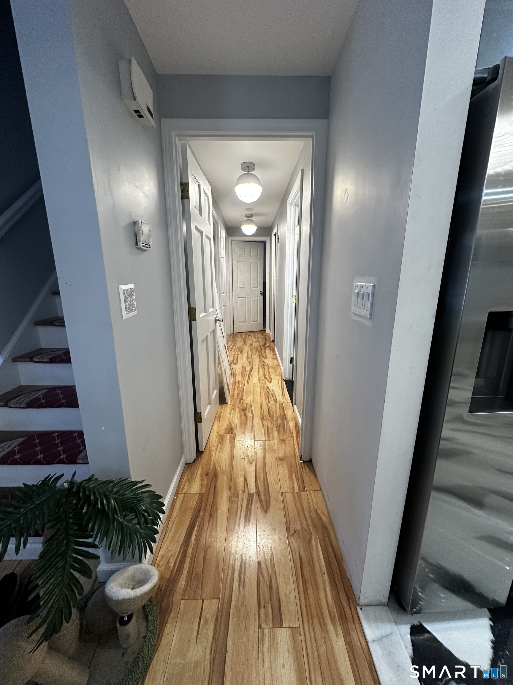 249 Wheeler Road Monroe, CT 06468 - Photo 18 of 39 a view of entryway with wooden floor