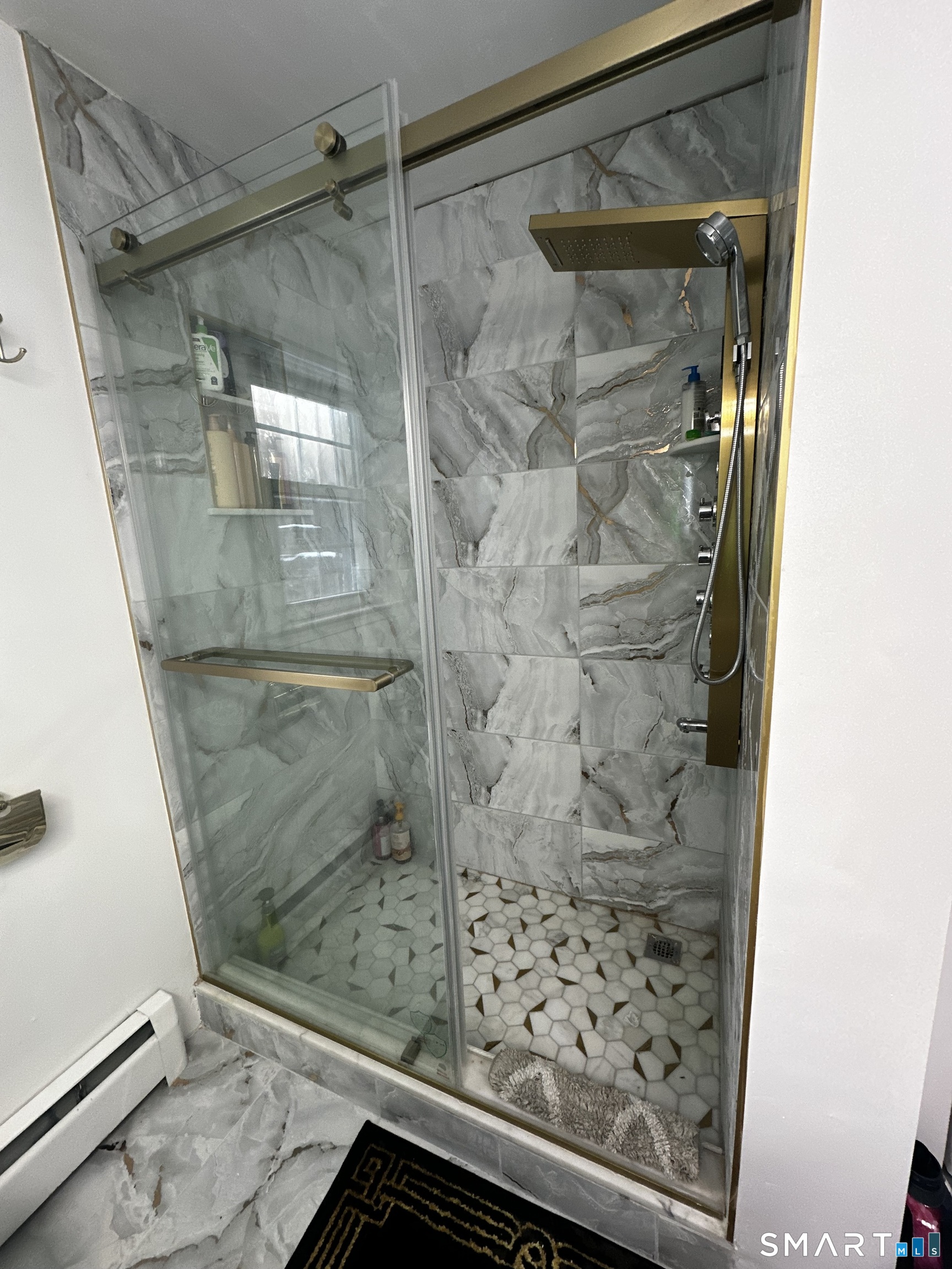 249 Wheeler Road Monroe, CT 06468 - Photo 22 of 39 a bathroom with a glass door shower