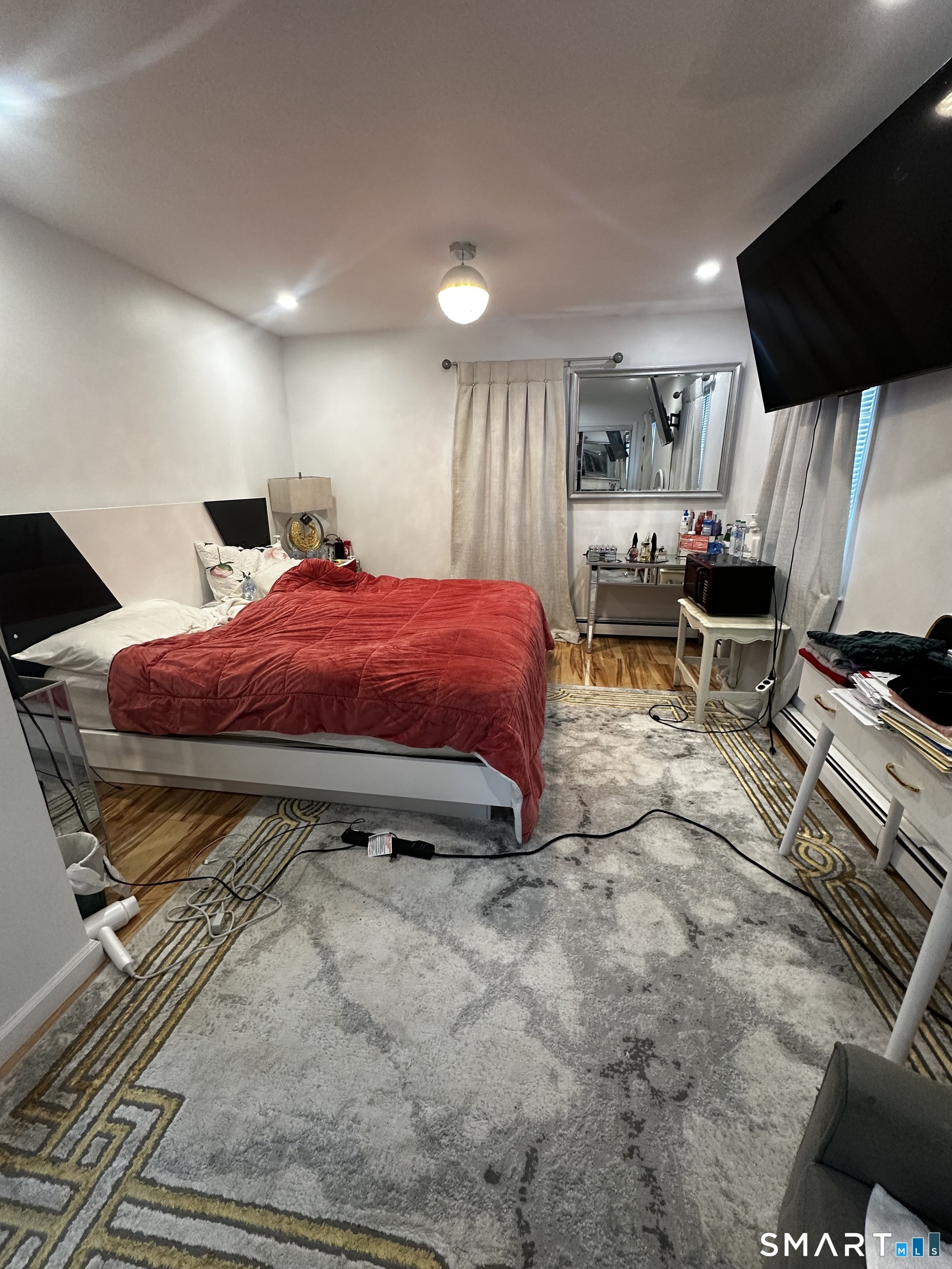 249 Wheeler Road Monroe, CT 06468 - Photo 22 of 39 a bed room with a bed and a flat screen tv