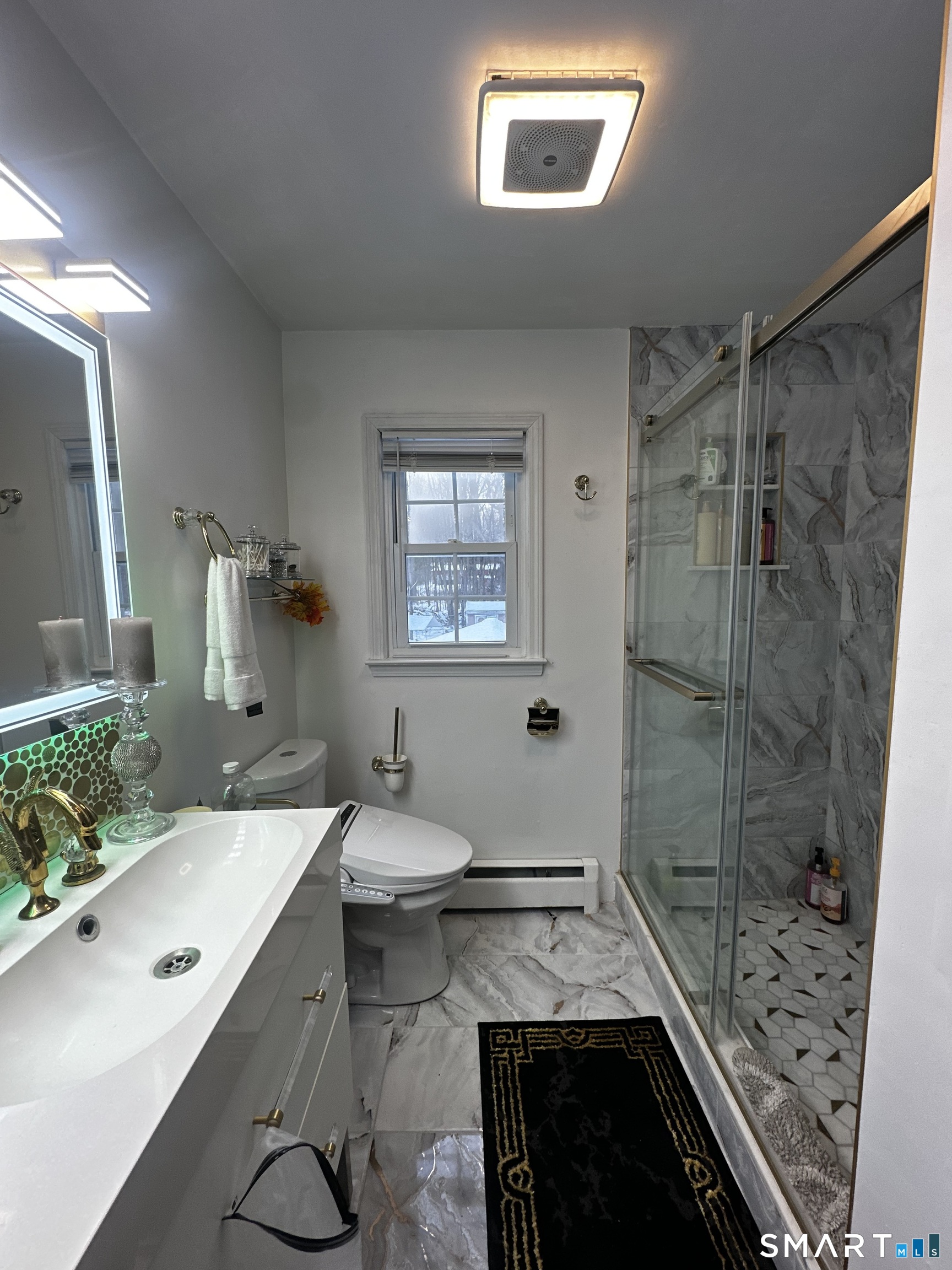 249 Wheeler Road Monroe, CT 06468 - Photo 25 of 39 a bathroom with a sink and a mirror