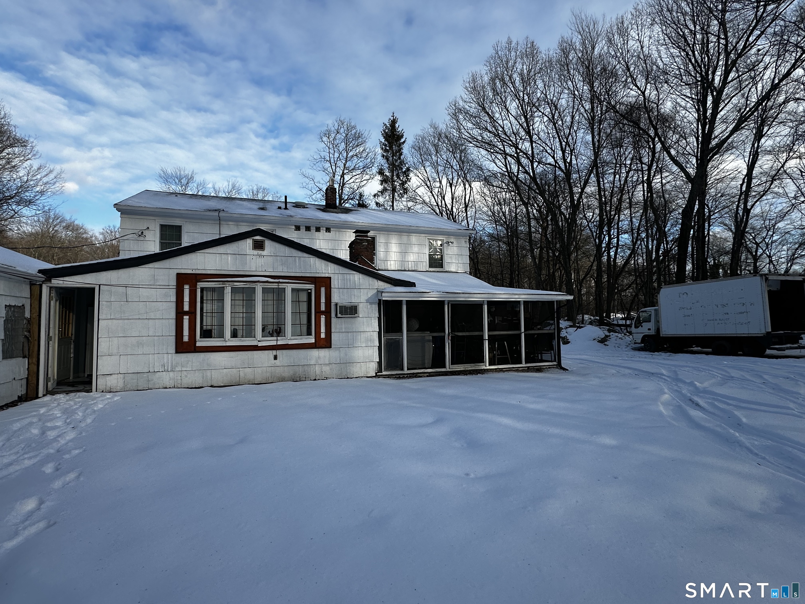 249 Wheeler Road Monroe, CT 06468 - Photo 3 of 39 a front view of a house with a yard