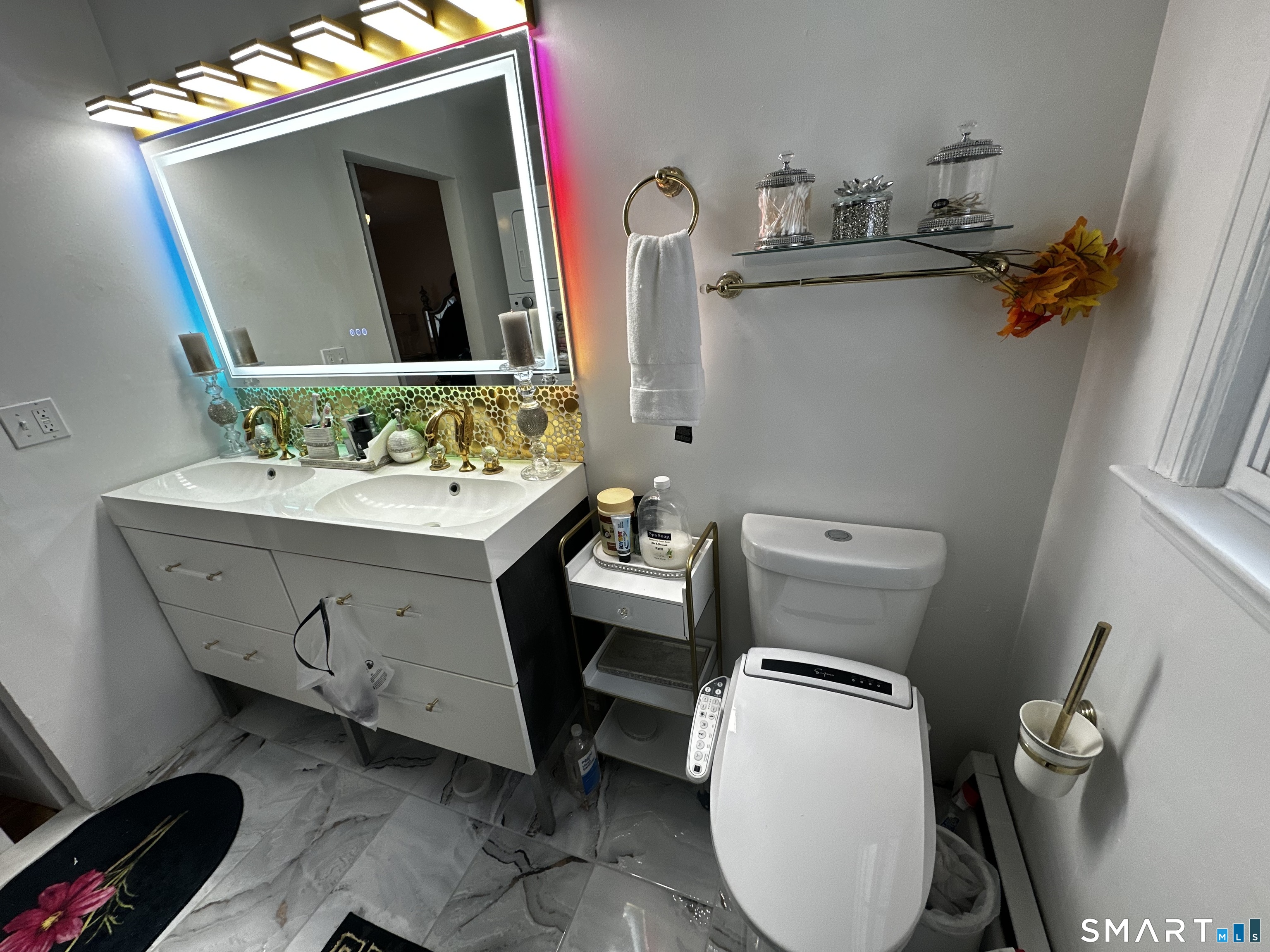 249 Wheeler Road Monroe, CT 06468 - Photo 37 of 39 a bathroom with a toilet sink and mirror