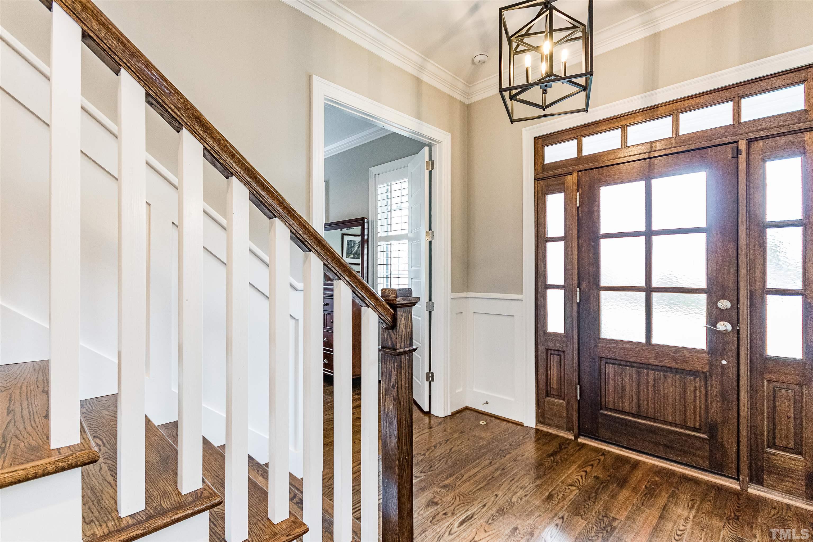641 Cranbrook Road Raleigh, NC 27609 - Photo 4 of 39 a view of an entryway with staircase