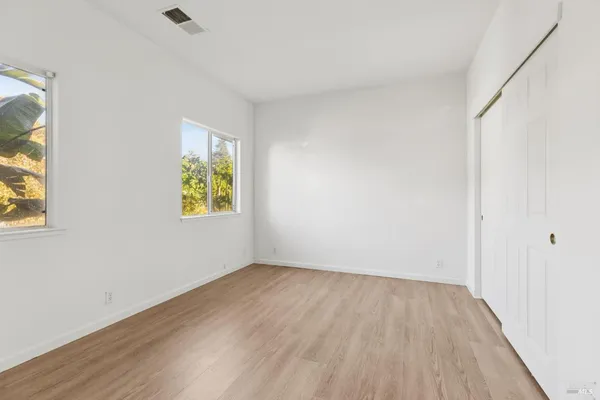 an empty room with windows