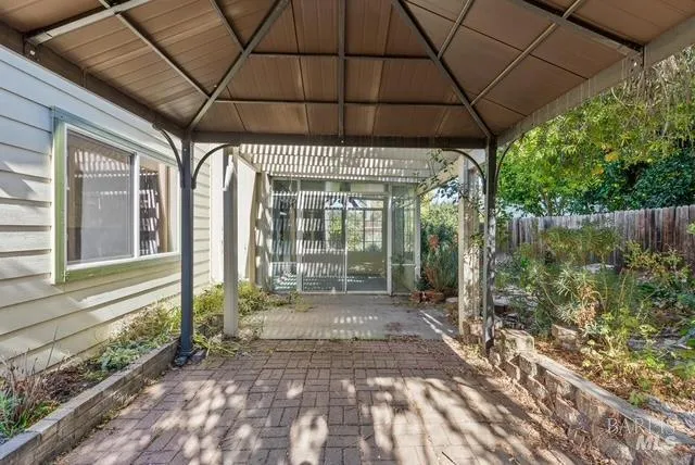 a backyard of a house with lots of green space