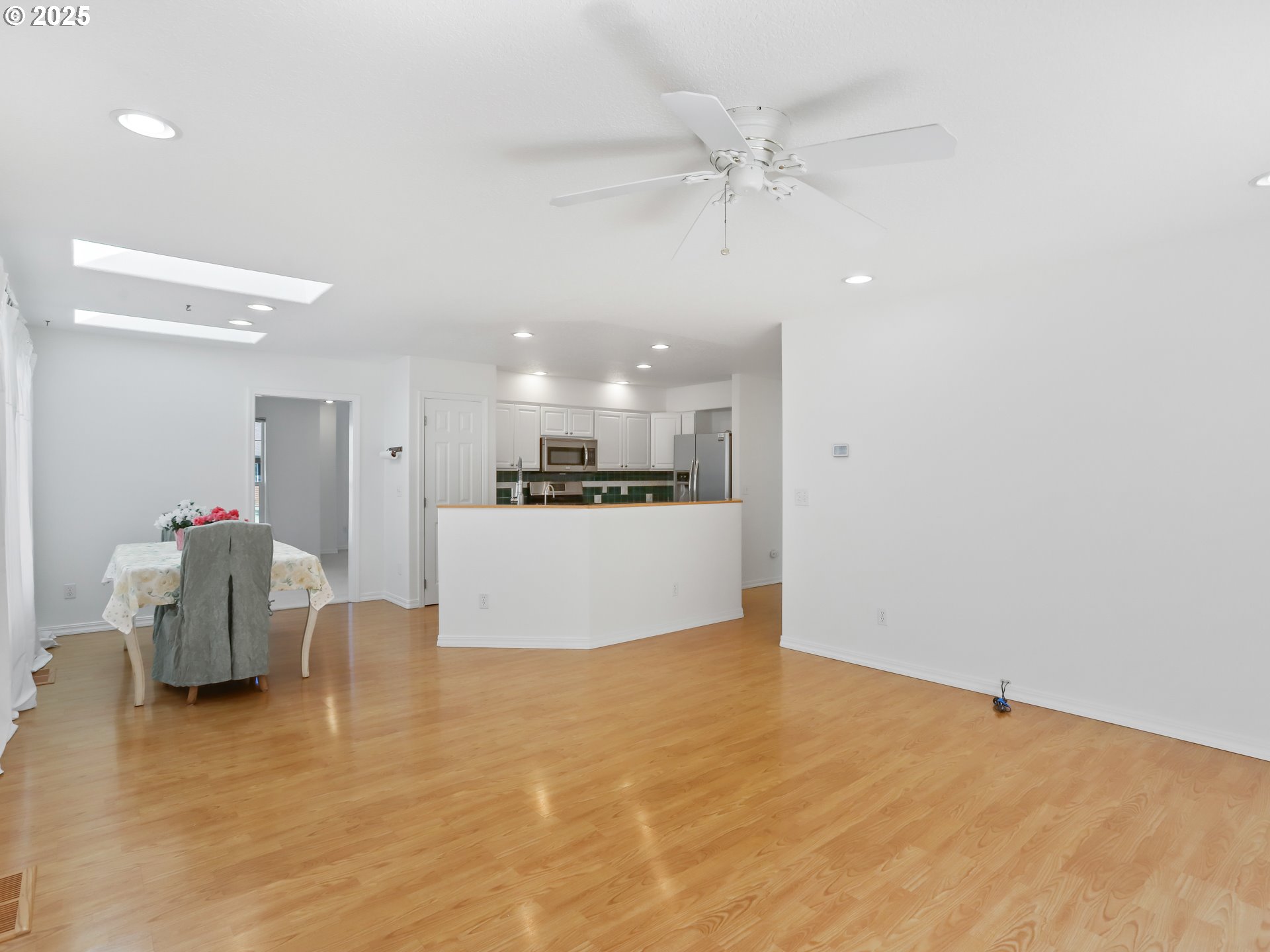 17265 Amber Lane Sandy, OR 97055 - Photo 12 of 46 a view of kitchen and hall with stainless steel appliances