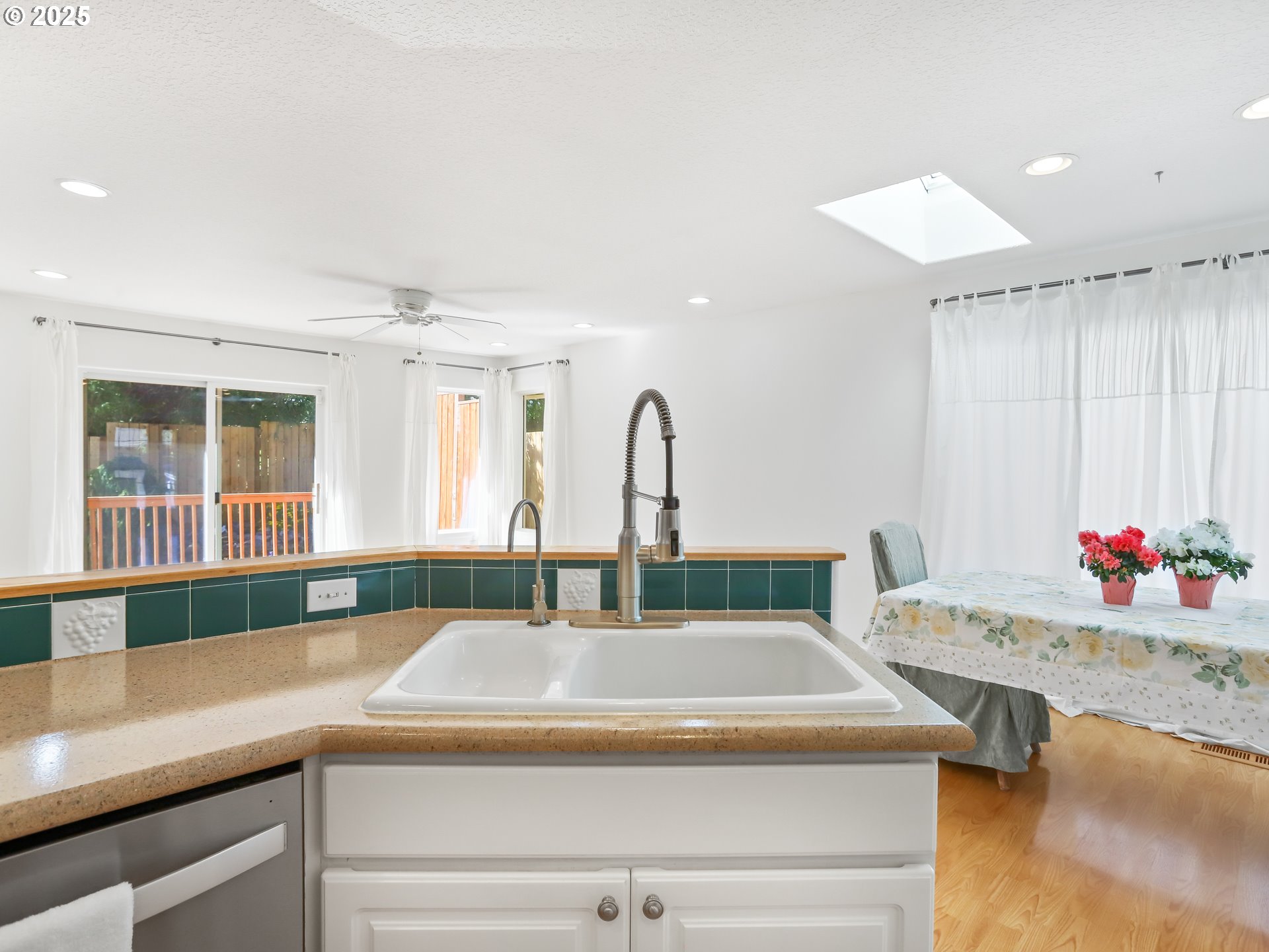 17265 Amber Lane Sandy, OR 97055 - Photo 14 of 46 a kitchen with a sink cabinets and window