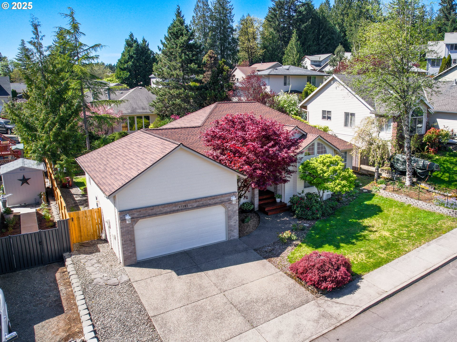 17265 Amber Lane Sandy, OR 97055 - Photo 2 of 46 a front view of a house with a yard