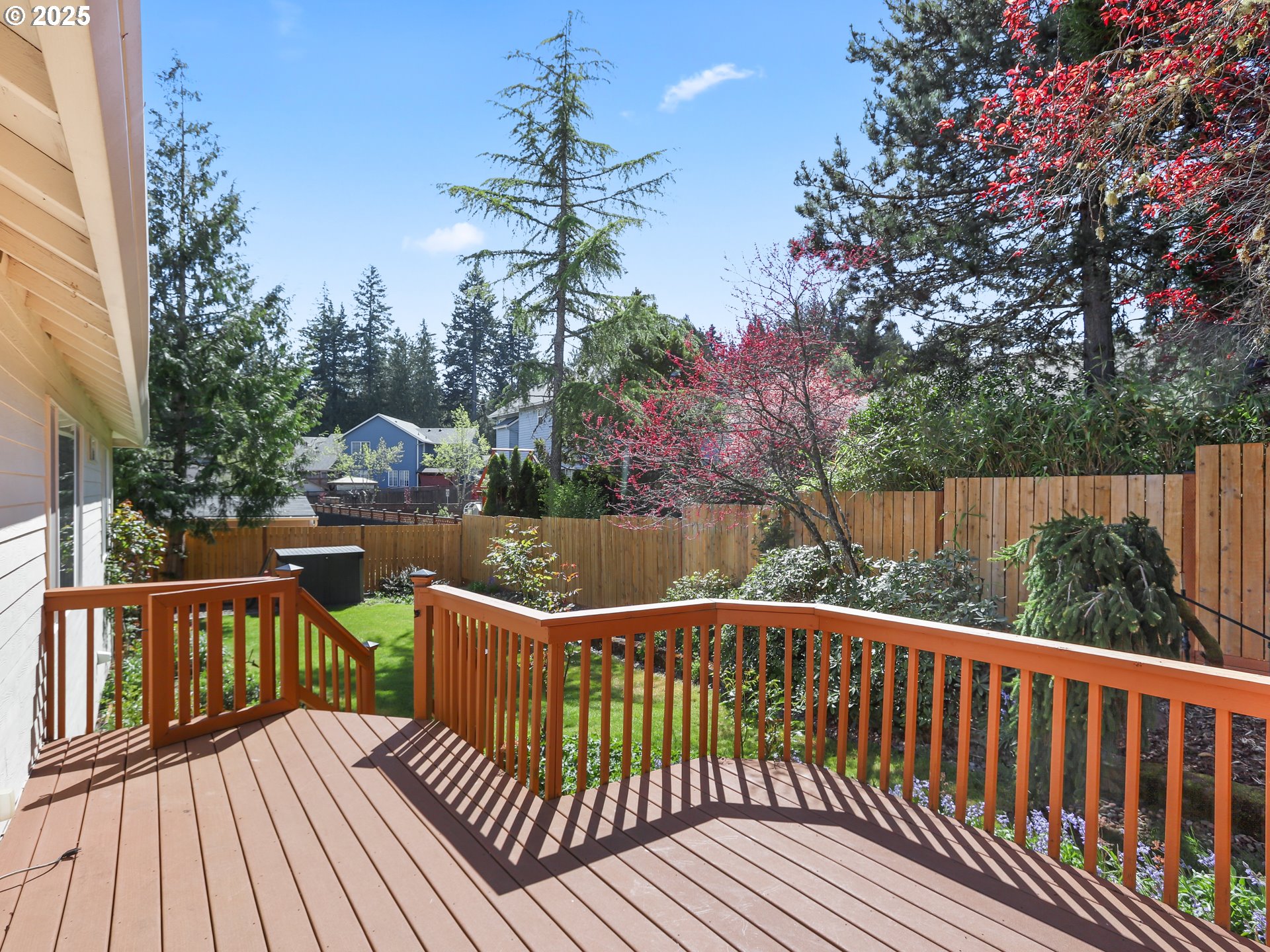 17265 Amber Lane Sandy, OR 97055 - Photo 21 of 46 a view of a wooden deck with a bench