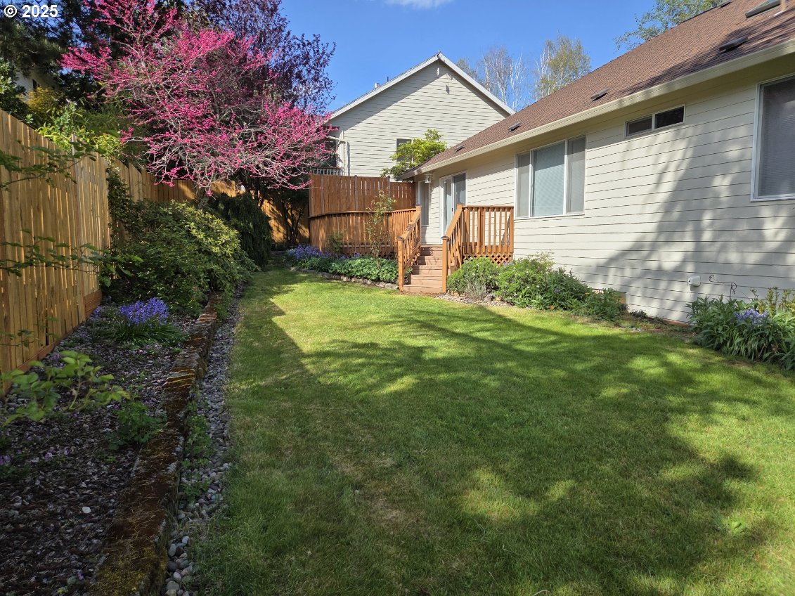 17265 Amber Lane Sandy, OR 97055 - Photo 25 of 46 a view of a house with a backyard