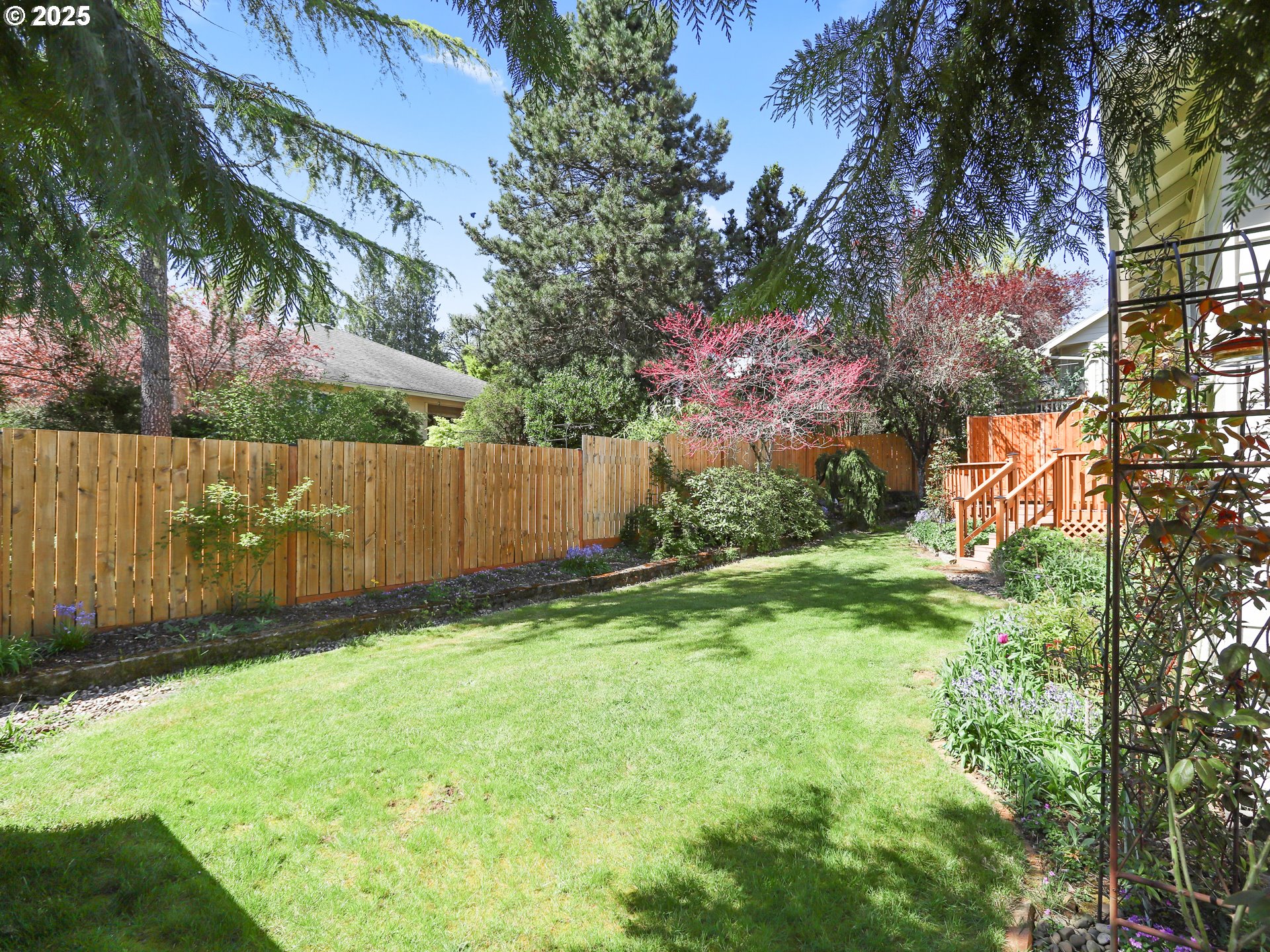 17265 Amber Lane Sandy, OR 97055 - Photo 26 of 46 a backyard of a house with lots of green space
