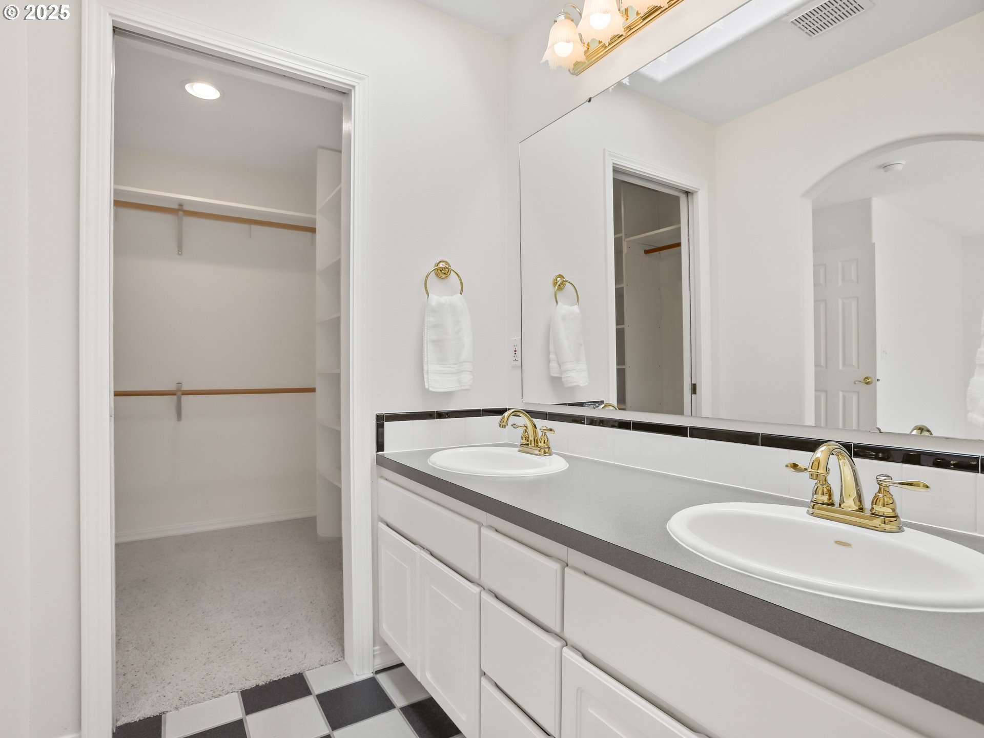 17265 Amber Lane Sandy, OR 97055 - Photo 35 of 46 a bathroom with a sink and a mirror