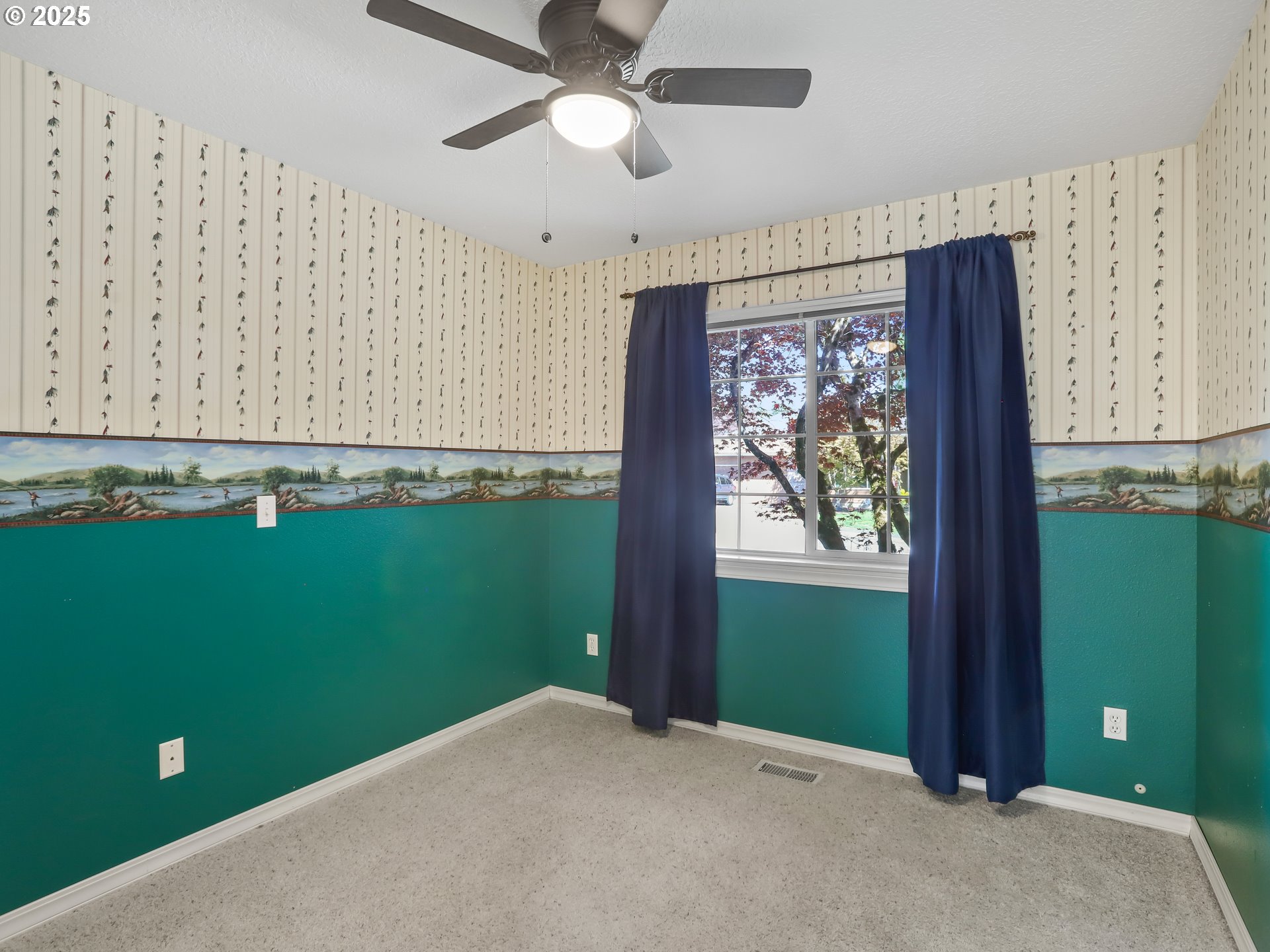17265 Amber Lane Sandy, OR 97055 - Photo 36 of 46 a view of an empty room with a window and cabinet