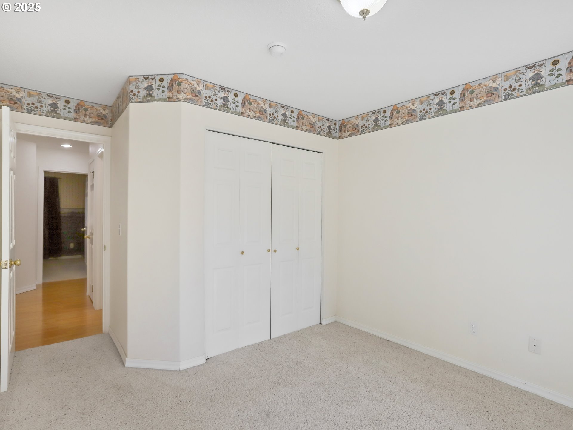 17265 Amber Lane Sandy, OR 97055 - Photo 40 of 46 a view of a room with fan and wooden floor