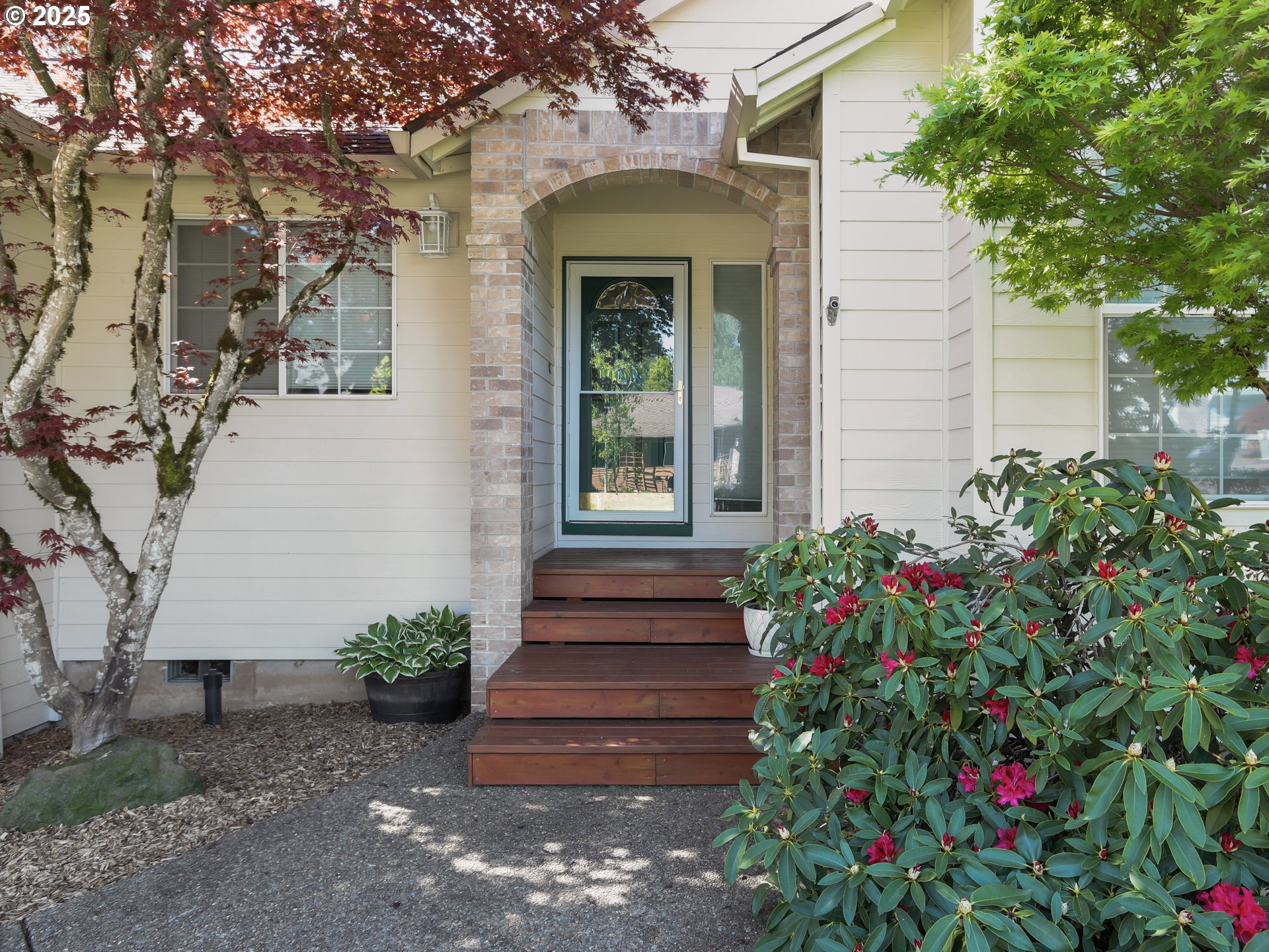 17265 Amber Lane Sandy, OR 97055 - Photo 4 of 46 a view of a house with potted plants