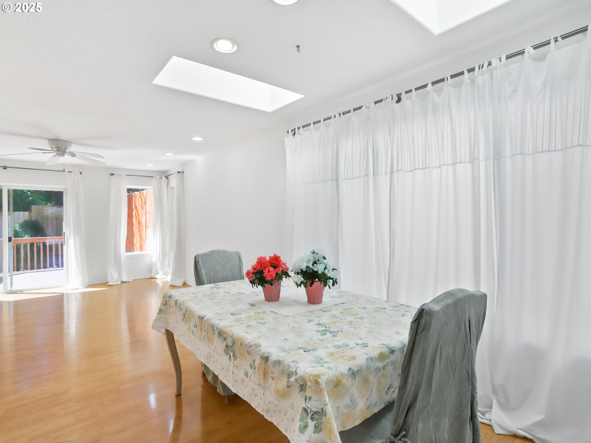 17265 Amber Lane Sandy, OR 97055 - Photo 10 of 46 a view of a dining room with furniture and wooden floor