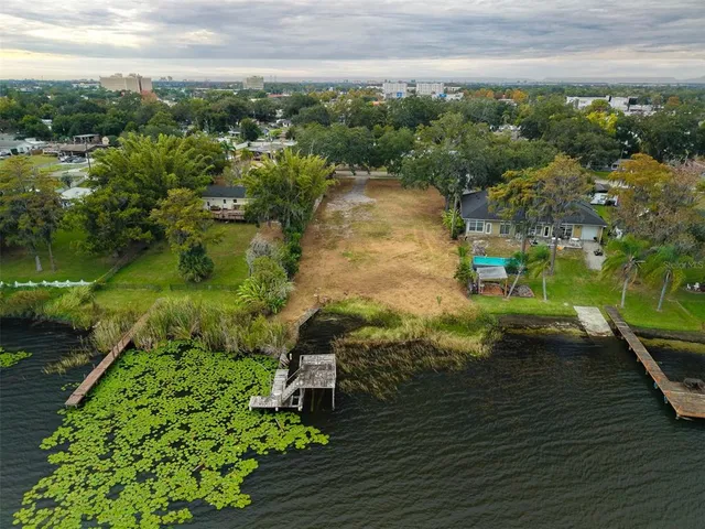 a view of a lake with a yard