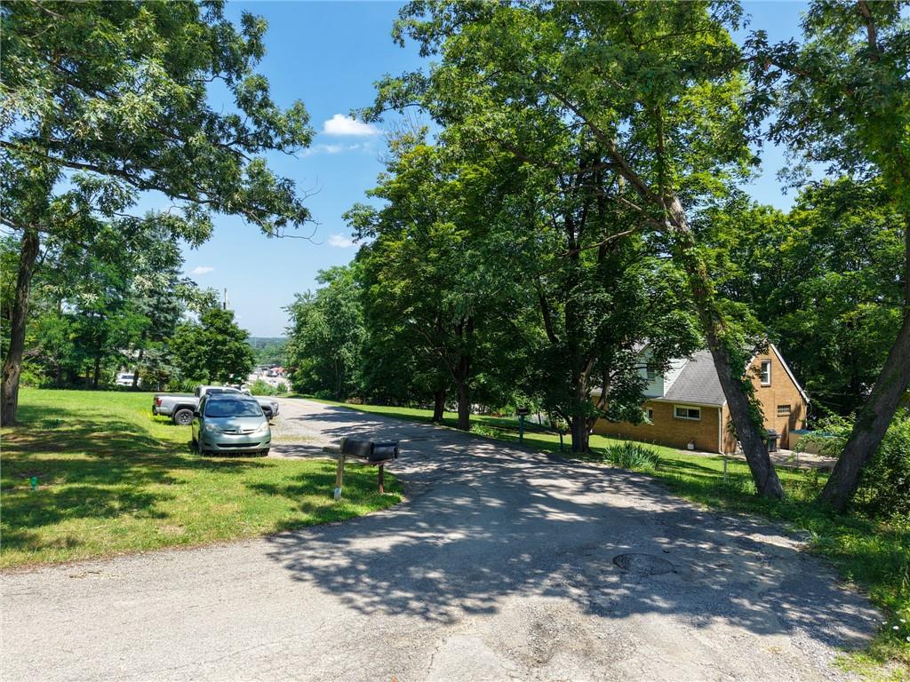 101 Ziegler Street Mars, PA 16046 - Photo 20 of 29 a view of a park with large trees
