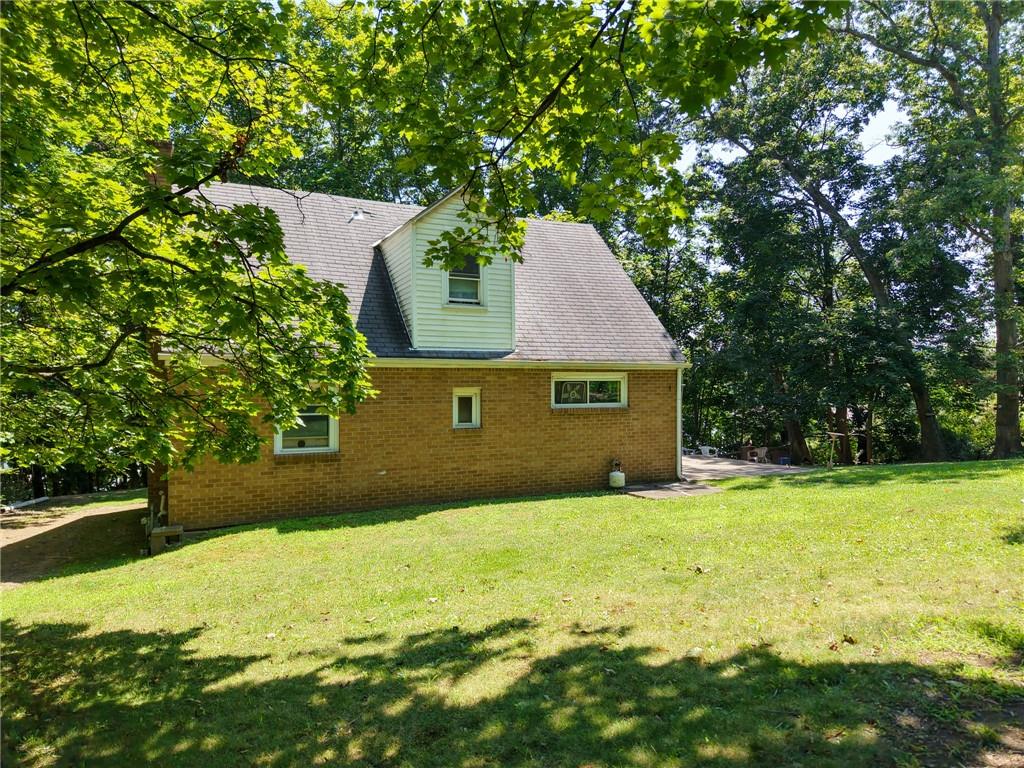 101 Ziegler Street Mars, PA 16046 - Photo 2 of 29 a front view of a house with yard