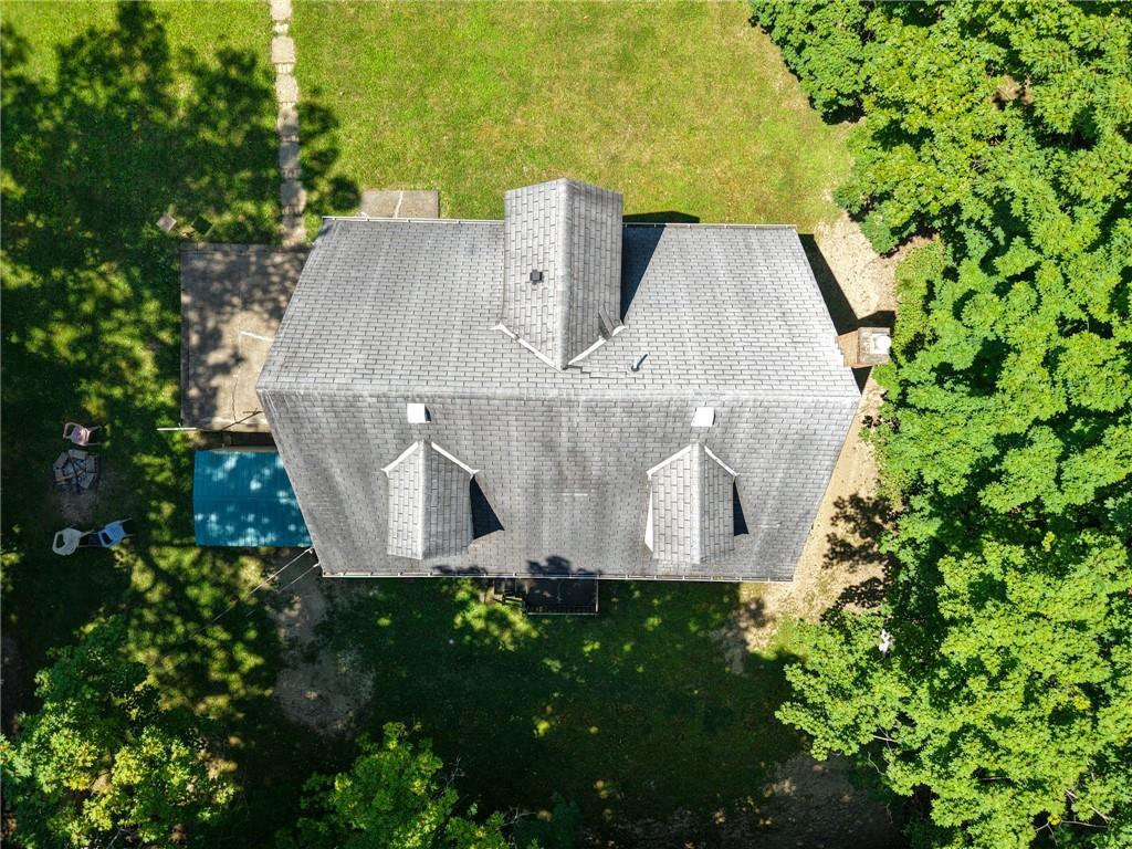 101 Ziegler Street Mars, PA 16046 - Photo 21 of 29 an aerial view of a house with yard and trees all around