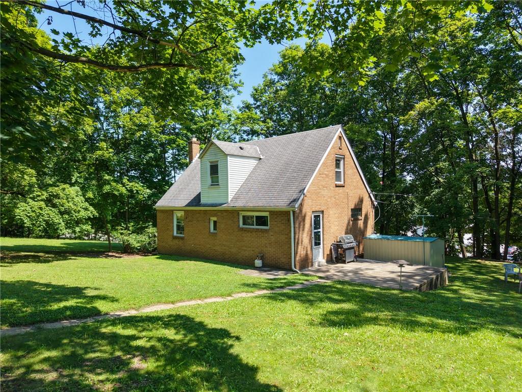 101 Ziegler Street Mars, PA 16046 - Photo 3 of 29 a view of house with backyard