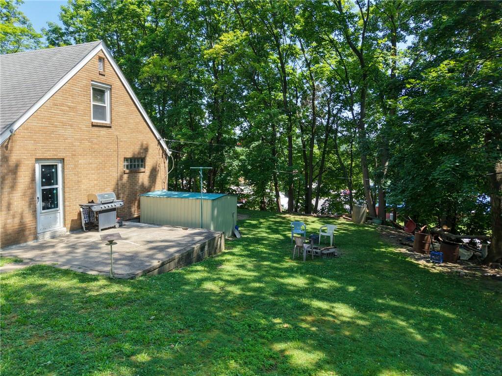 101 Ziegler Street Mars, PA 16046 - Photo 4 of 29 a view of a house with backyard and sitting area