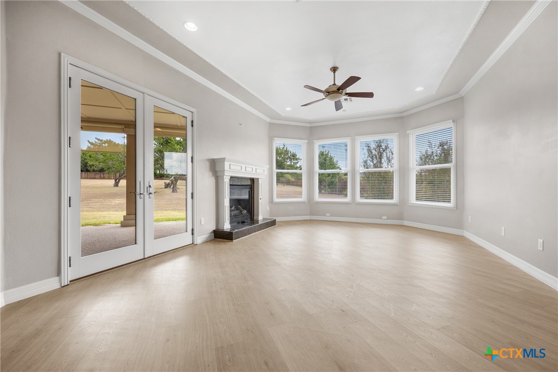 6717 Springwood Court Temple, TX 76502 - Photo 27 of 33 a view of an empty room with a window and wooden floor