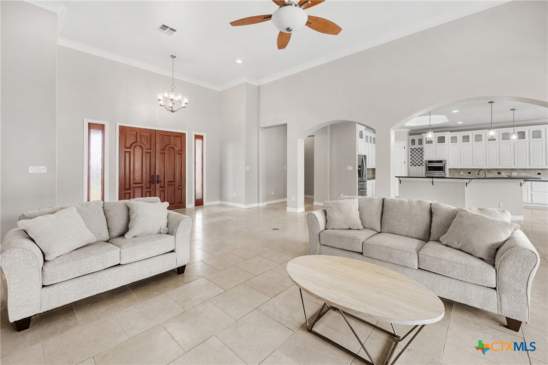 6717 Springwood Court Temple, TX 76502 - Photo 6 of 33 a living room with furniture and a large window
