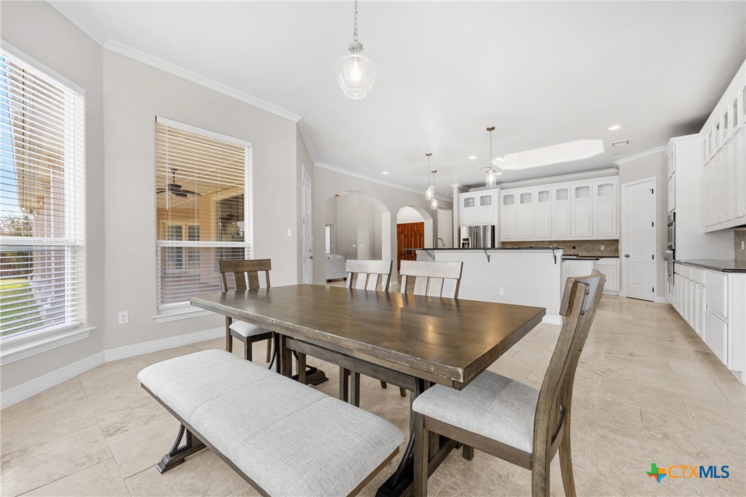 6717 Springwood Court Temple, TX 76502 - Photo 9 of 33 a dining room with furniture and wooden floor