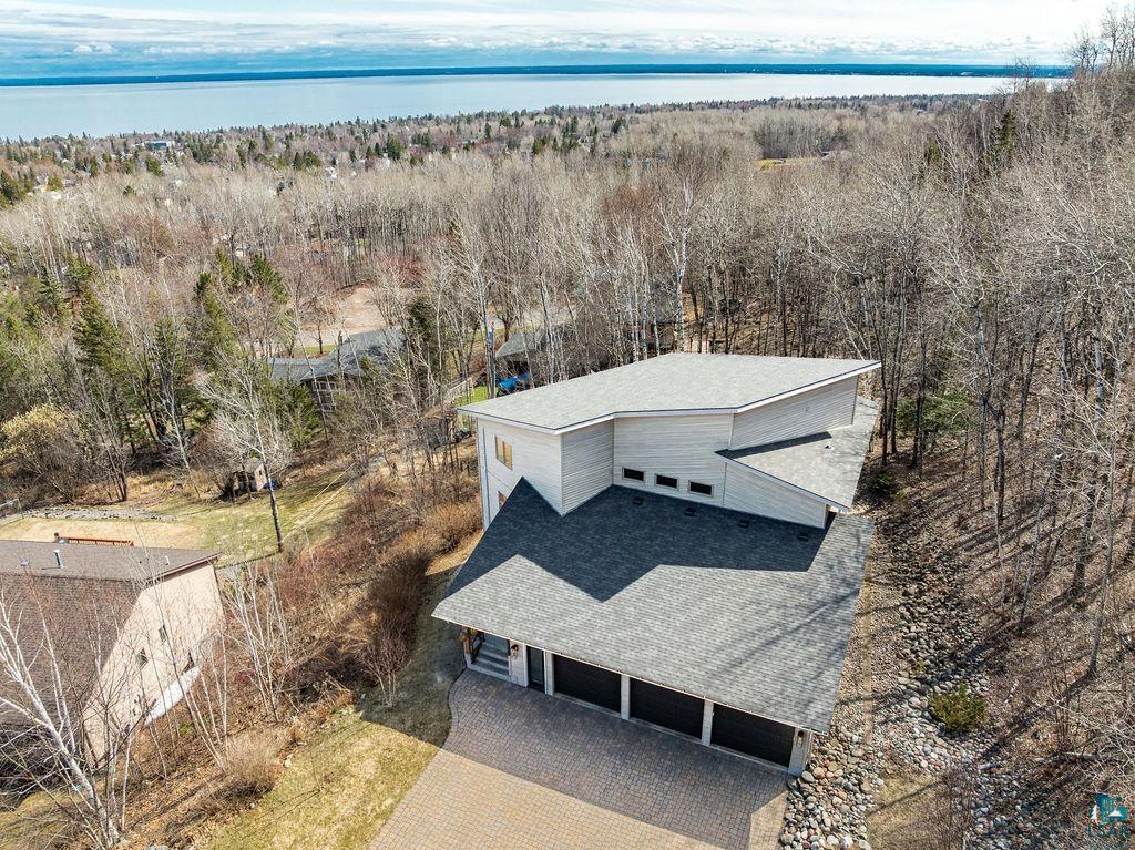 4856 Kingston Street Duluth, MN 55804 - Photo 63 of 88 Contemporary multi-level residence with a dark shingle roof and light-toned siding