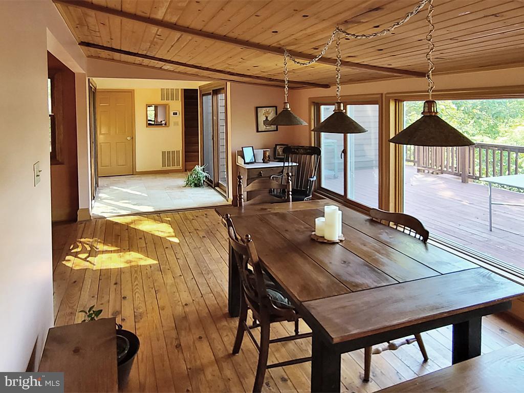 1245 Khyber Pass Road Linden, VA 22642 - Photo 30 of 55 Dining room, opens up with sliding glass windows